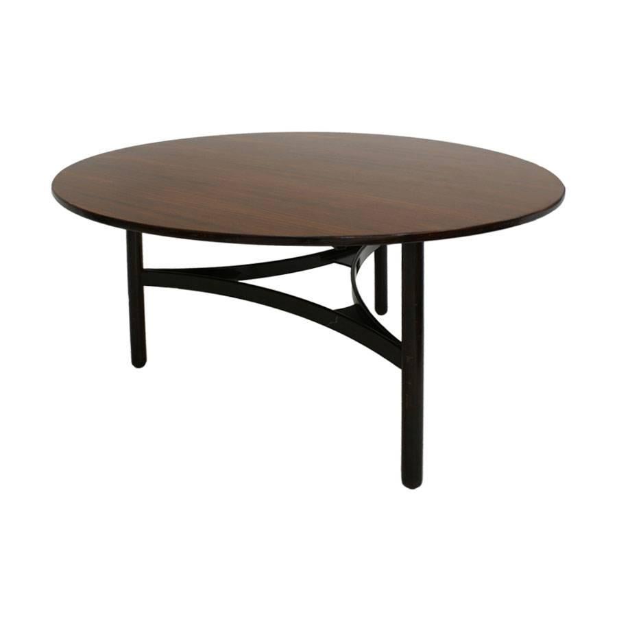 Circular dining table designed by Italian Gianfranco Frattini and edited by Cassina. Structure made of rosewood.
Signed by Cassina.

Gianfranco Frattini (born May 16, 1926, Padua, Italy–died April 6, 2004, Milan, Italy) was an Italian designer