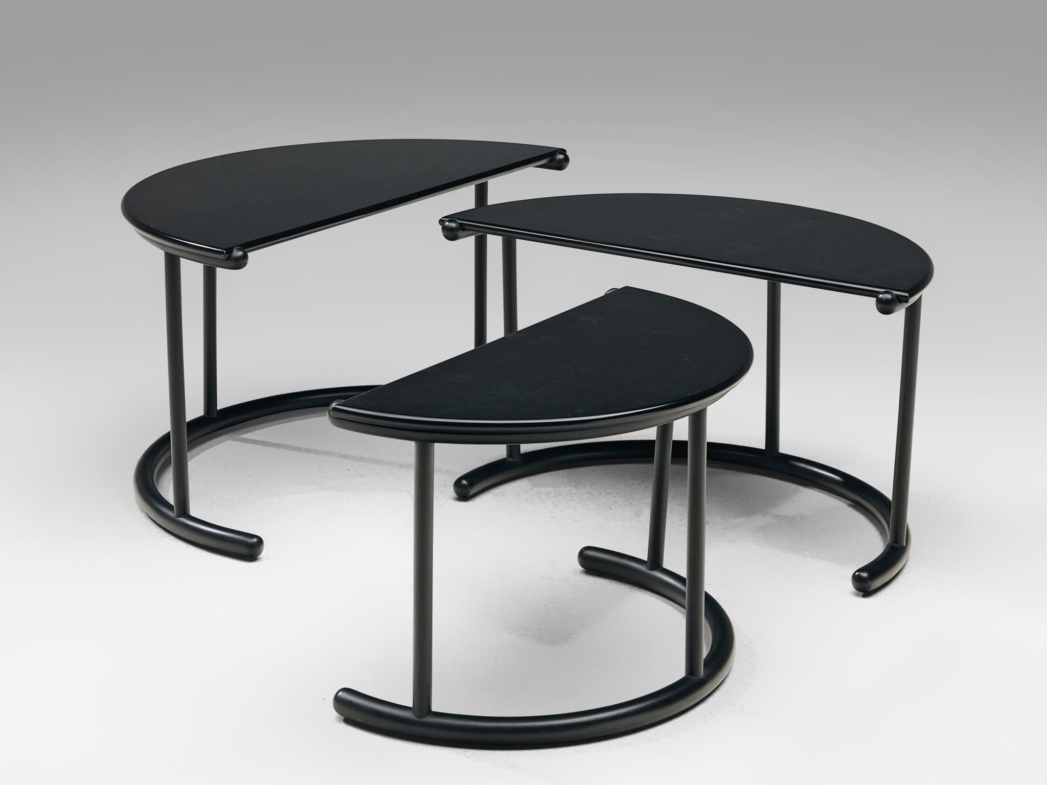 Gianfranco Frattini for Acerbis, set of three 'Tria' nesting tables, lacquered wood, Italy, 1980s

A set of three nesting tables by the Italian designer Gianfranco Frattini. Each table consists of a semi-circled tabletop in black lacquered wood. The