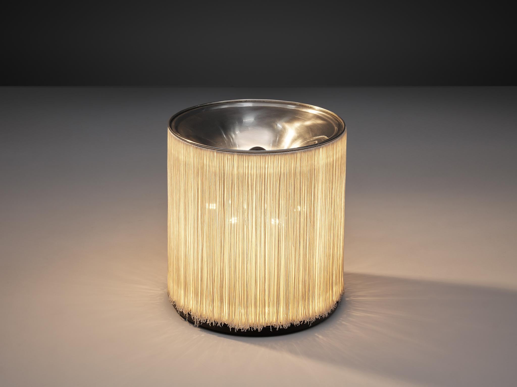 Gianfranco Frattini for Arteluce, table lamp model 597, aluminium, rayon, Italy, 1961

Gianfranco Frattini designed this innovative table lamp 597 for Arteluce in 1961. A central conical shaped base holds multiple light bulbs which are behind a