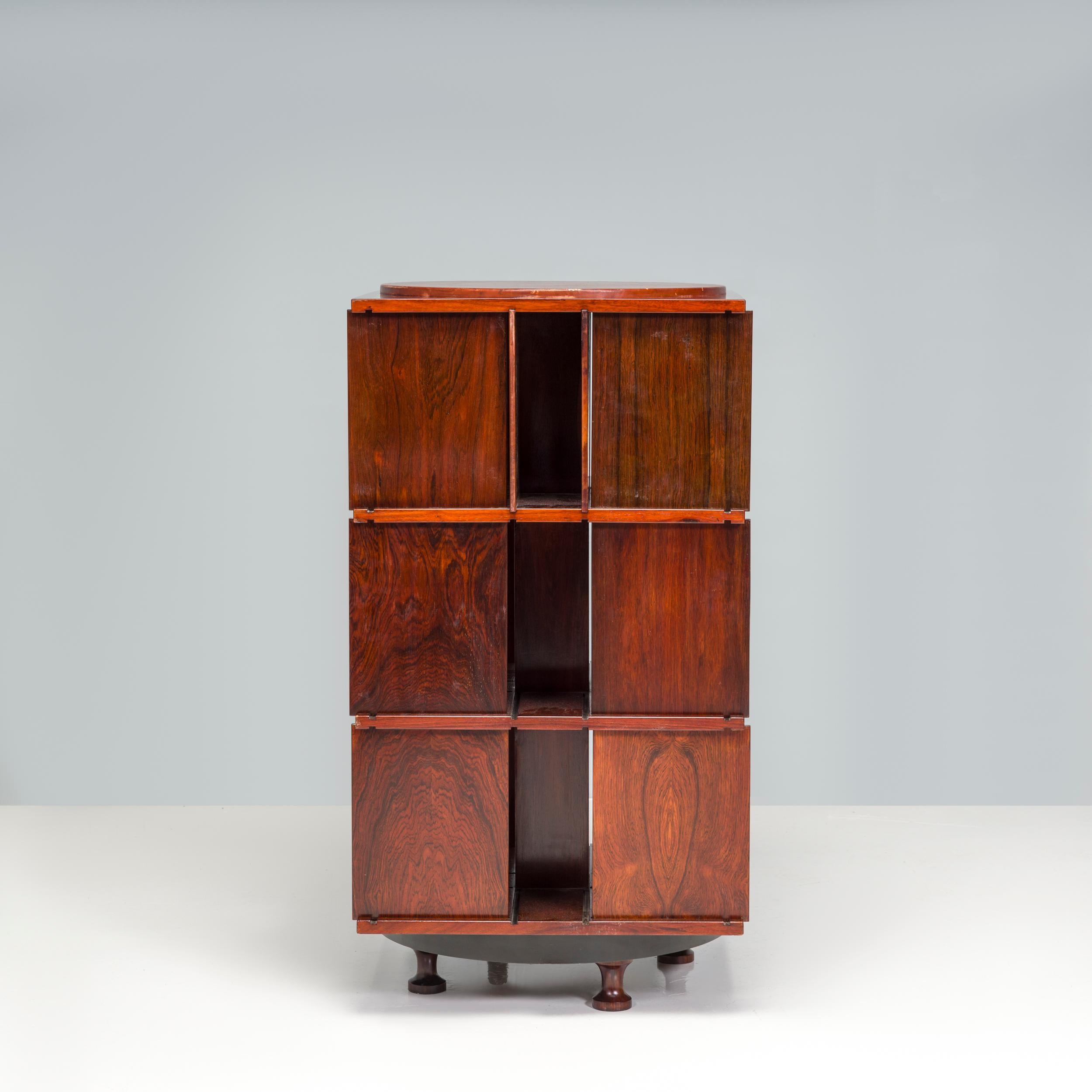 Originally designed in 1963 by Gianfranco Frattini, the Modello 823 bookshelf was manufactured by Bernini. After going out of production Poltrona Frau re-issued the design in 2022 under a new name.

The bookshelf, constructed from Rio Rosewood, is a
