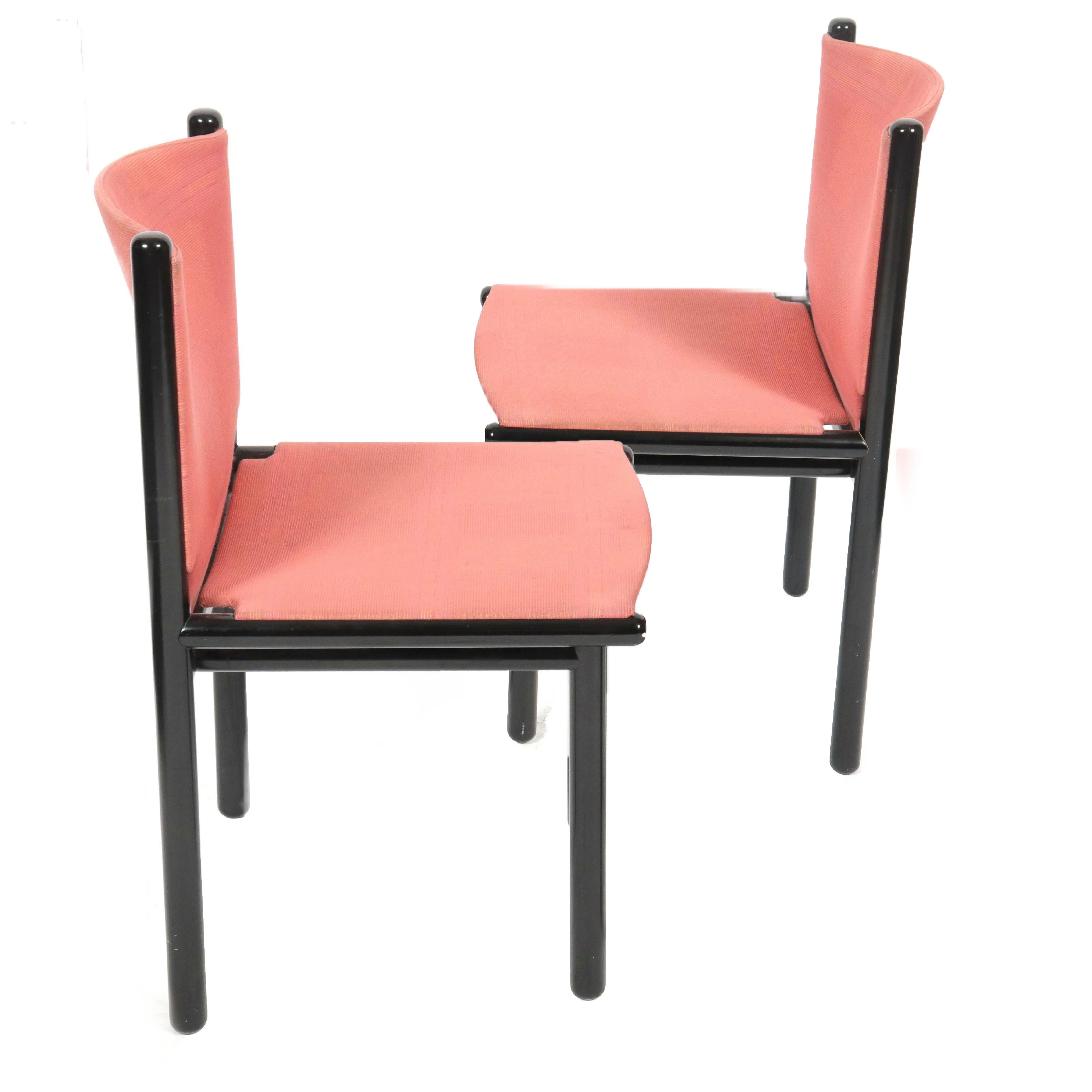 Cassina Caprile dining chair by Gianfranco Frattini. Gorgeous original woven textile with shades of pink and peach. Lovely lacquered wood frame. Labeled. Gianfranco Frattini realized this design after working on the Hilton Tokyo project in Japan.