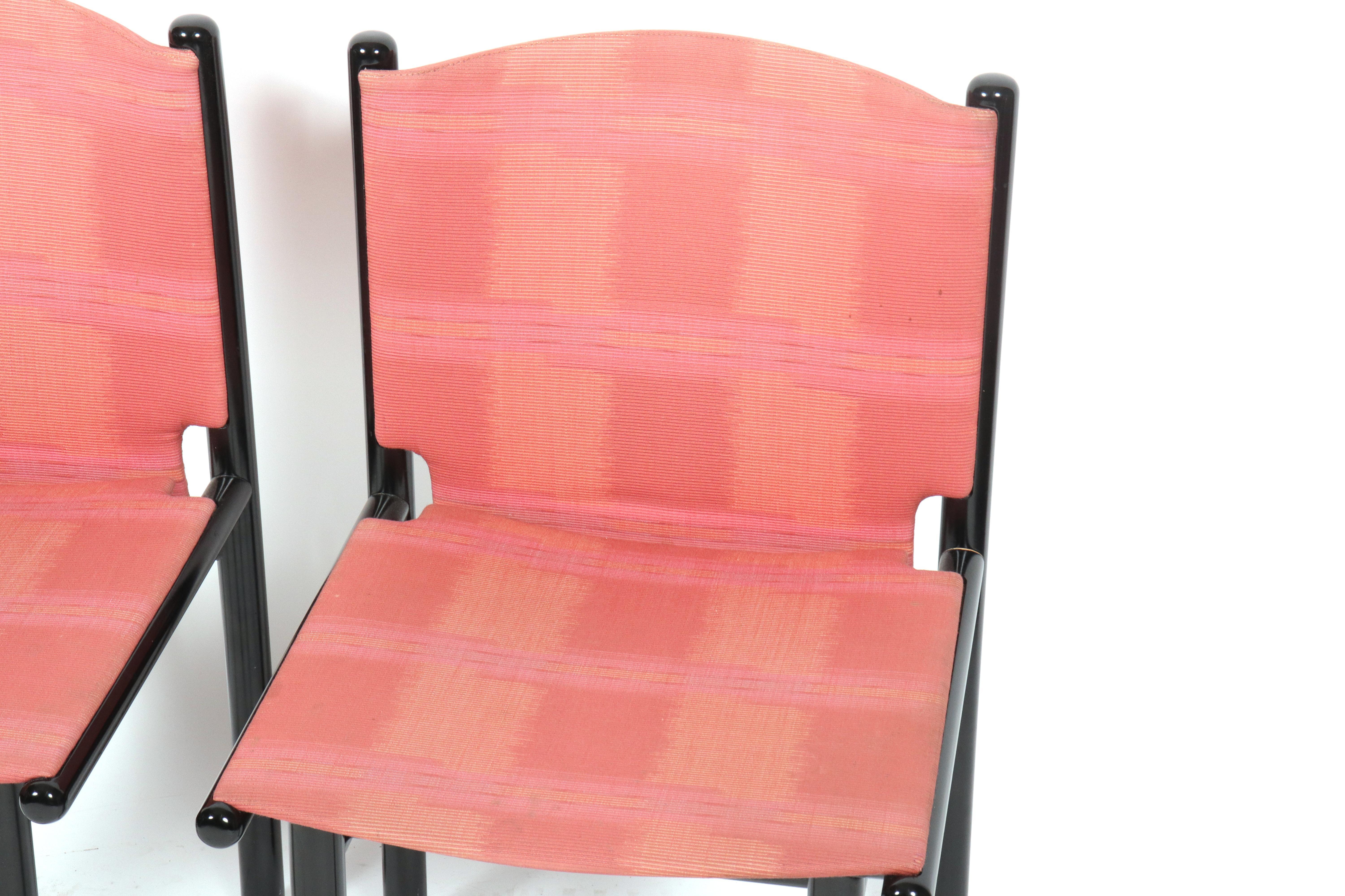 Cassina Caprile dining chair by Gianfranco Frattini. Gorgeous original woven textile with shades of pink and peach. Lovely lacquered wood frame. Labeled. Gianfranco Frattini realized this design after working on the Hilton Tokyo project in Japan.