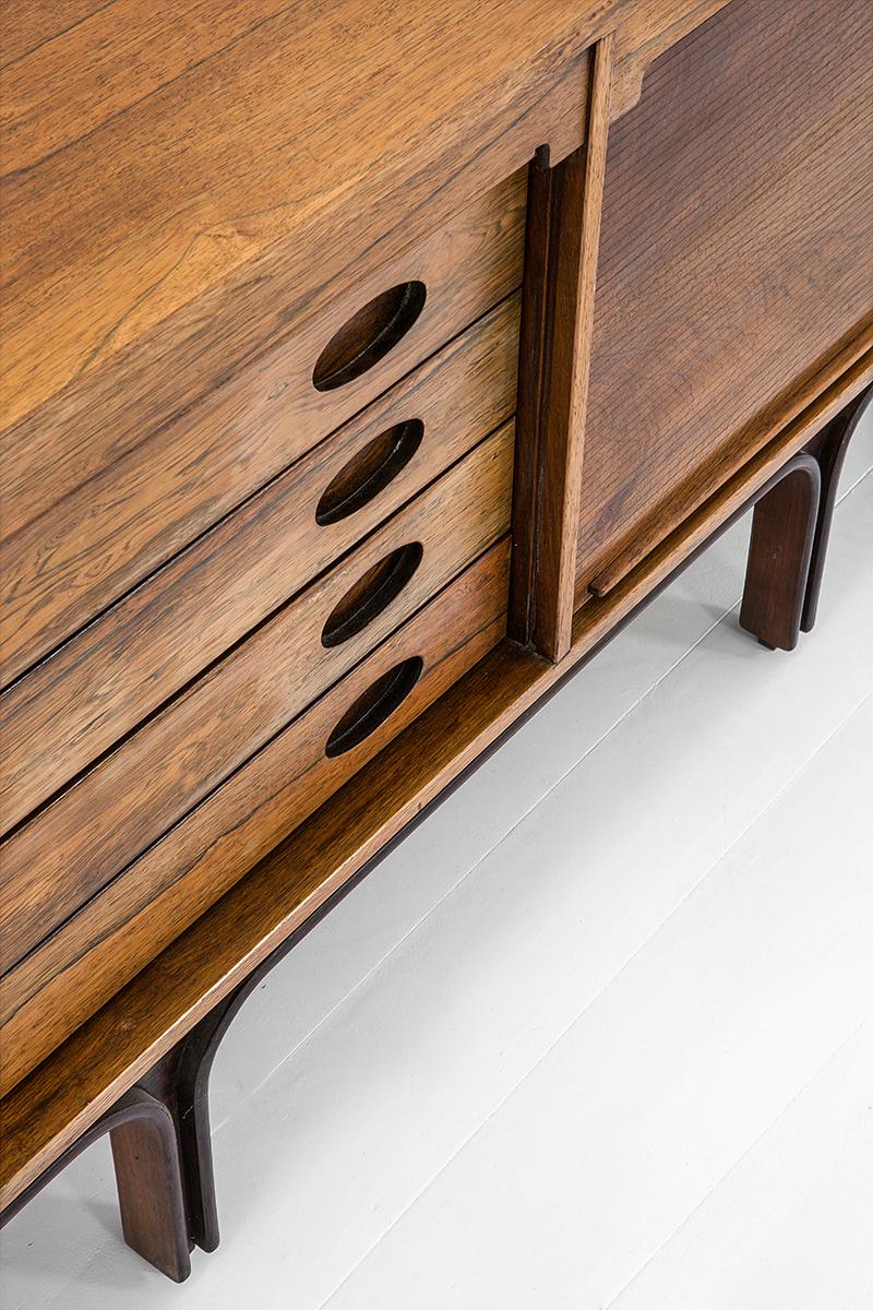 Rare high credenza in Brazilian rosewood by Gianfranco Frattini Model 504 made by Bernini, Italy around 1961. Vertical rolling curtain doors 
Good condition 
