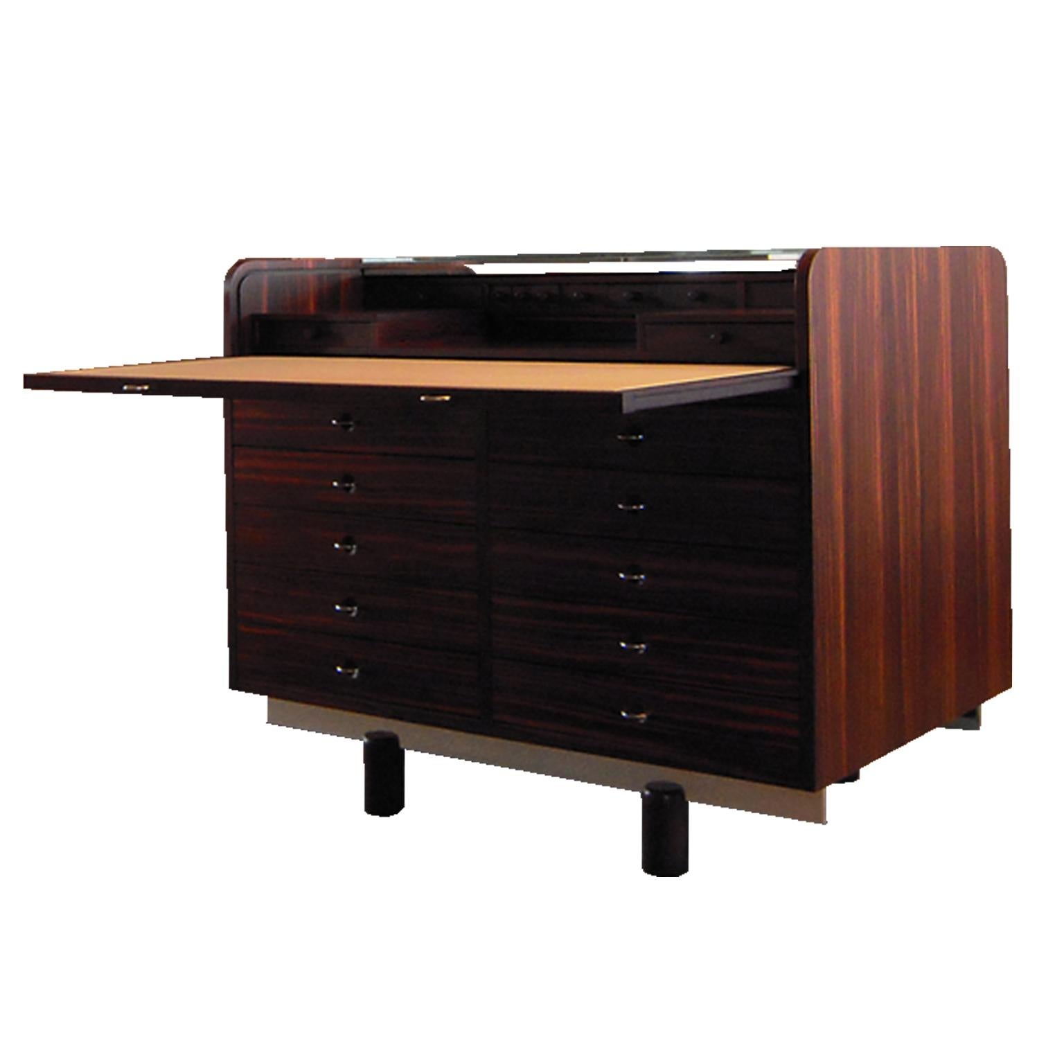 Double-sided secretaire designed by Italian Architect Gianfranco Frattini for Bernini manufacturer in 1961.
The secretaire we are selling was manufacturer in limited edition in ebony wood, numbered n° 001/002 with designer signature.
The