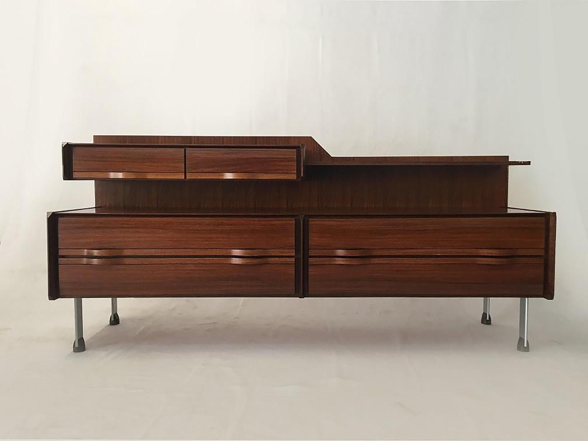Gianfranco Frattini - La Permente Mobili Cantú, chest of drawers
Italy, 1960-1969, wood, rosewood

Chest of drawers designed by Gianfranco Frattini in the 1960s for Cantù La Permanente,
 made of rosewood with metal legs, preserved in excellent