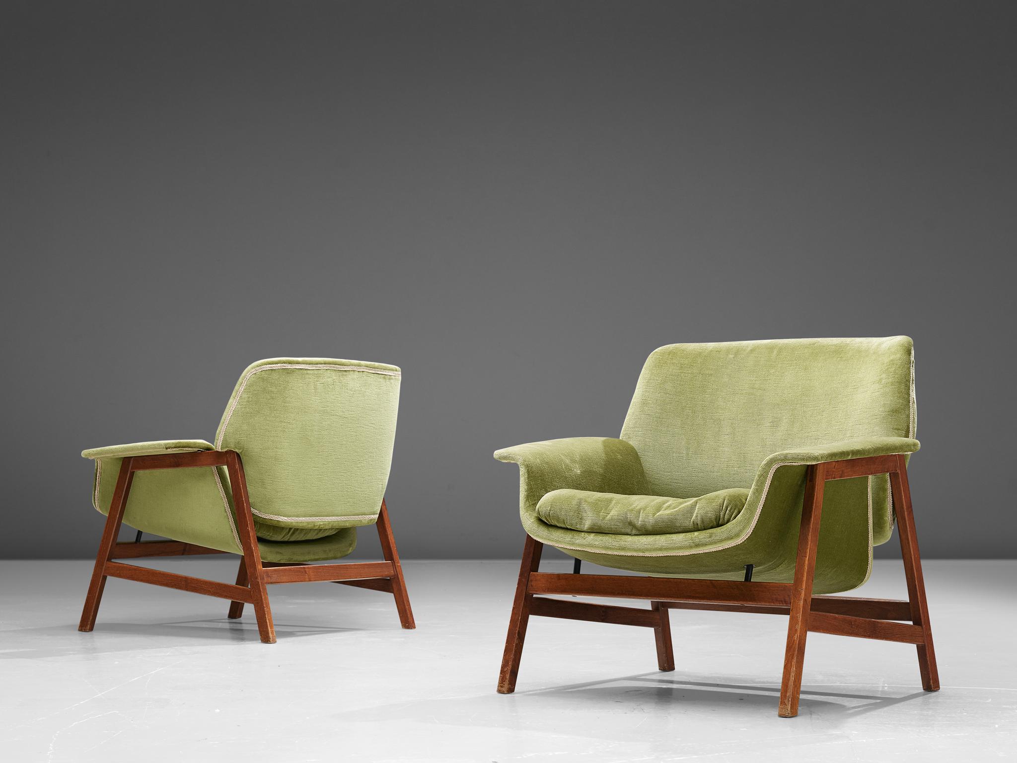 Gianfranco Frattini for Cassina, '849' easy chairs, walnut and fabric, Italy, 1956.

Wonderful pair of chairs by Gianfrano Frattini for Cassina. This model features a walnut frame which holds the seat and backrest. A shell forms the seat in an