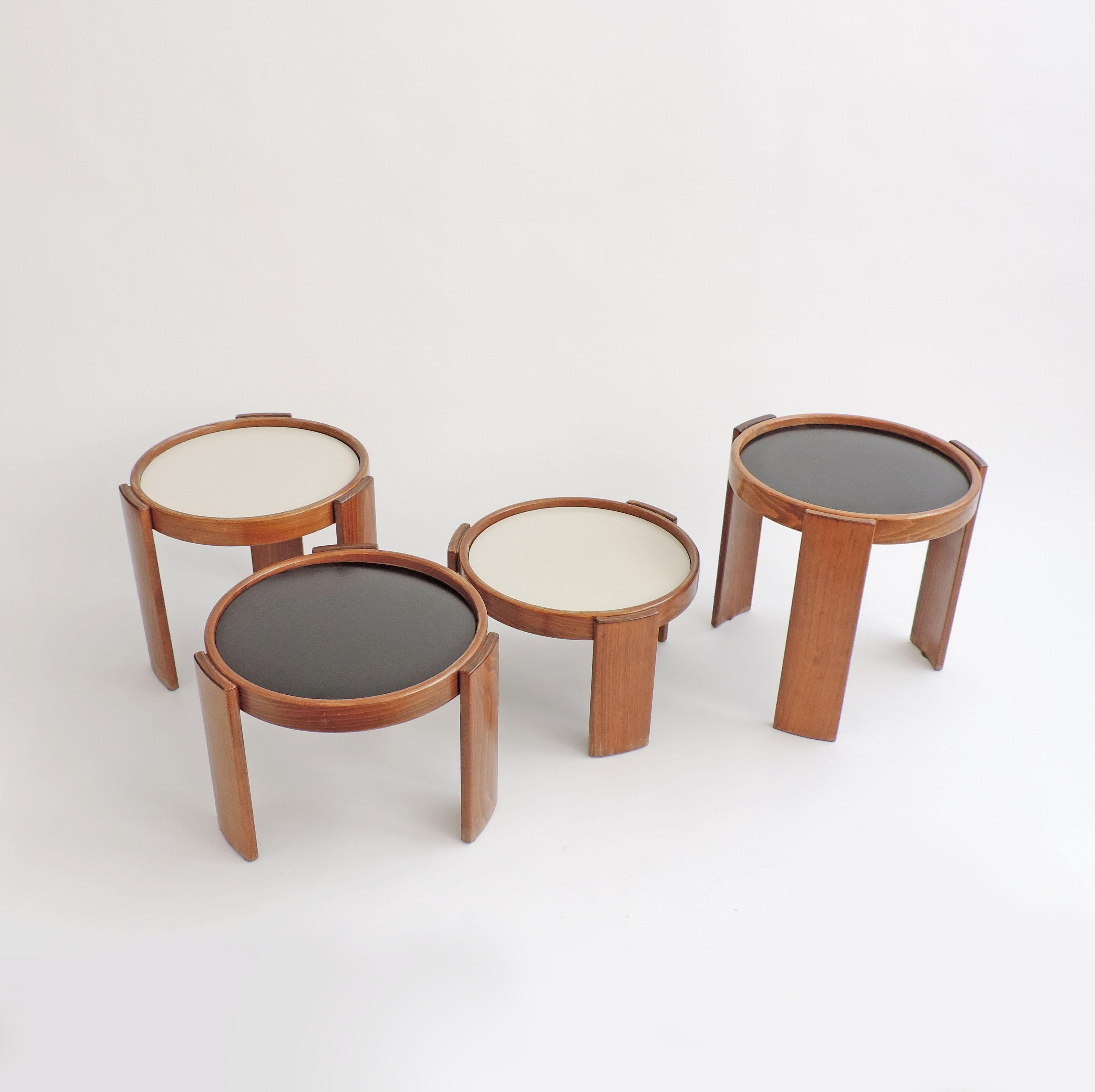 Gianfranco Frattini nesting tables for Cassina, Italy, 1966.
Wood nesting tables with black and white interchangeable tops
Original Cassina labels.