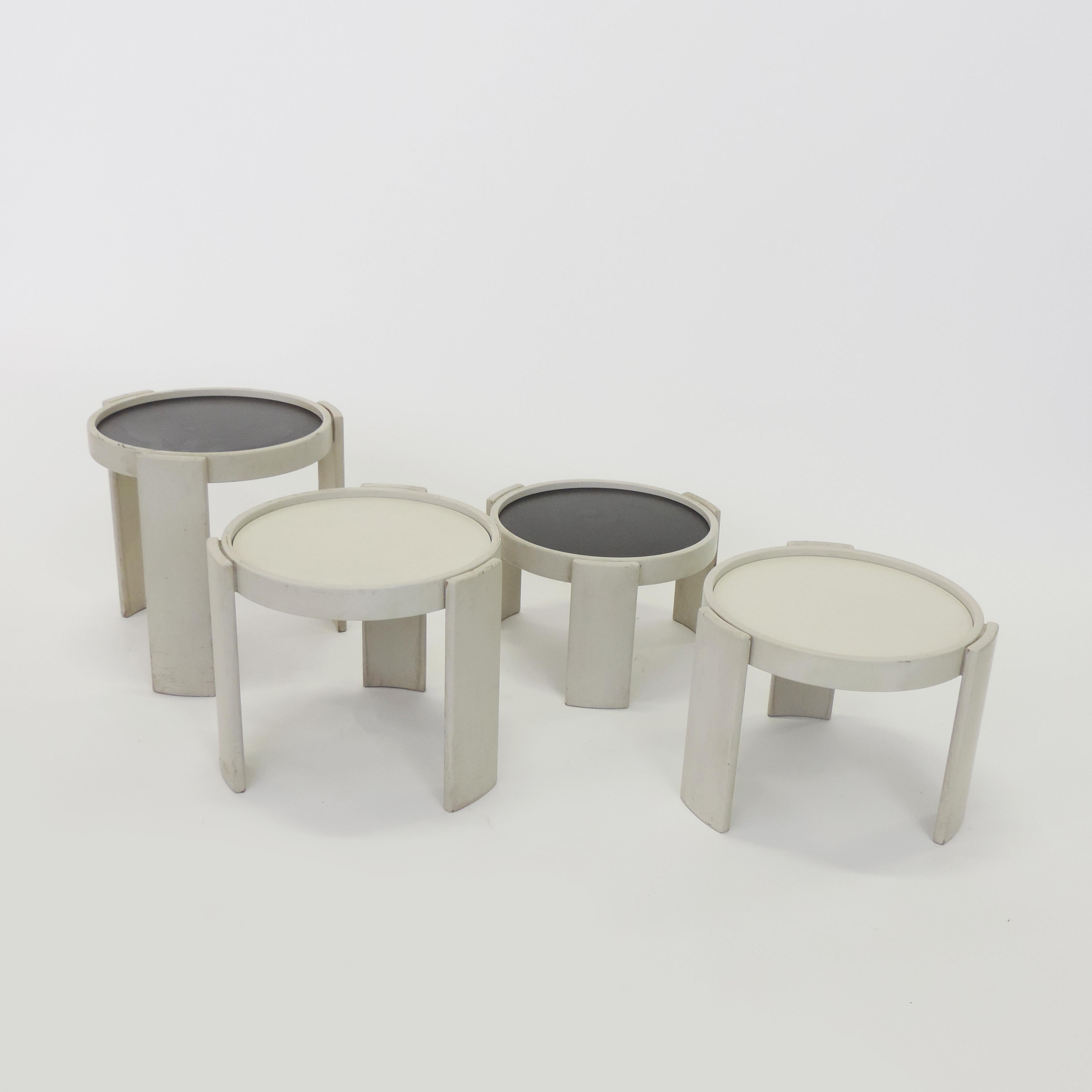 Gianfranco Frattini nesting tables in original light grey paint for Cassina, Italy, 1966.
Nesting tables with black and white interchangeable tops.
  