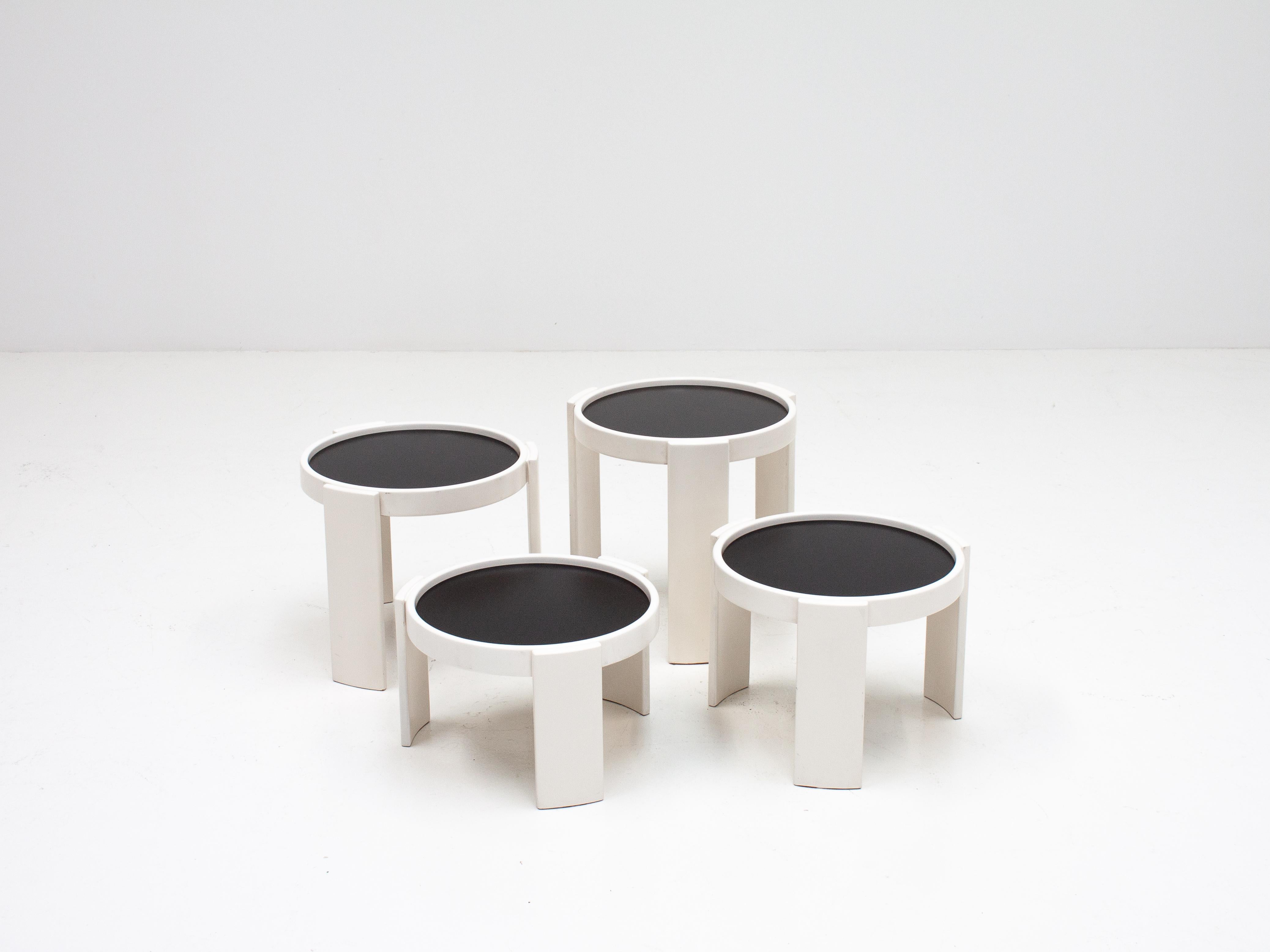 A set of nesting tables designed by Gianfranco Frattini for Cassina Italy and produced in the 1960s.

Consisting of four tables which form a cylinder shape, despite each table having the same circumference they stack perfectly due to the differing