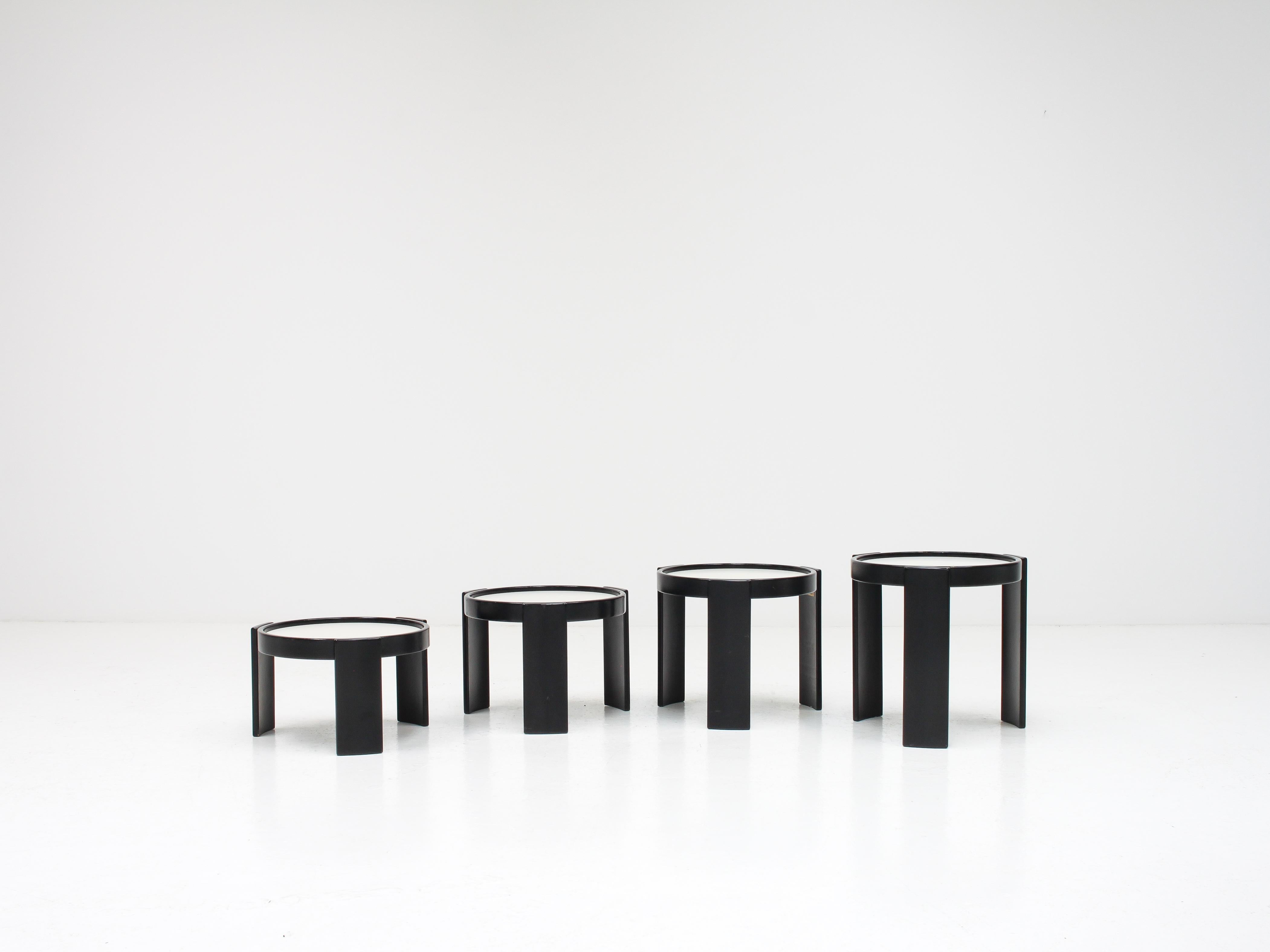 A set of nesting tables designed by Gianfranco Frattini for Cassina Italy and produced in the 1960s.

Consisting of four tables which form a cylinder shape, despite each table having the same circumference they stack perfectly due to the differing