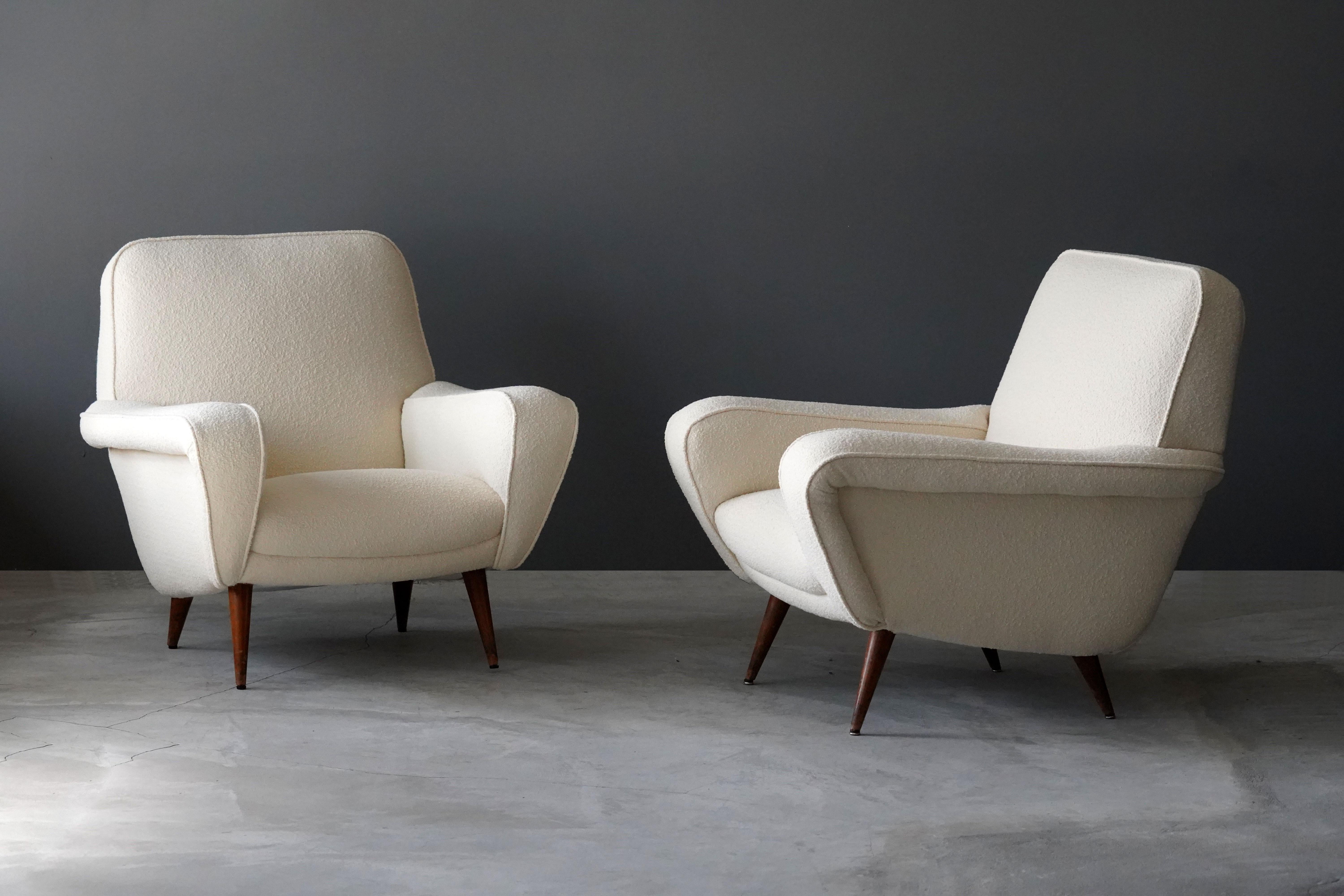 A pair of rare lounge chairs. Designed by Gianfranco Frattini, for Cassina, 1955. Reupholstered in brand new high end bouclé fabric.

Literature: 
Domus, n. 371, ottobre 1960, p. 41; I. de Guttry, M. P. Maino, Il mobile italiano degli anni '40 e