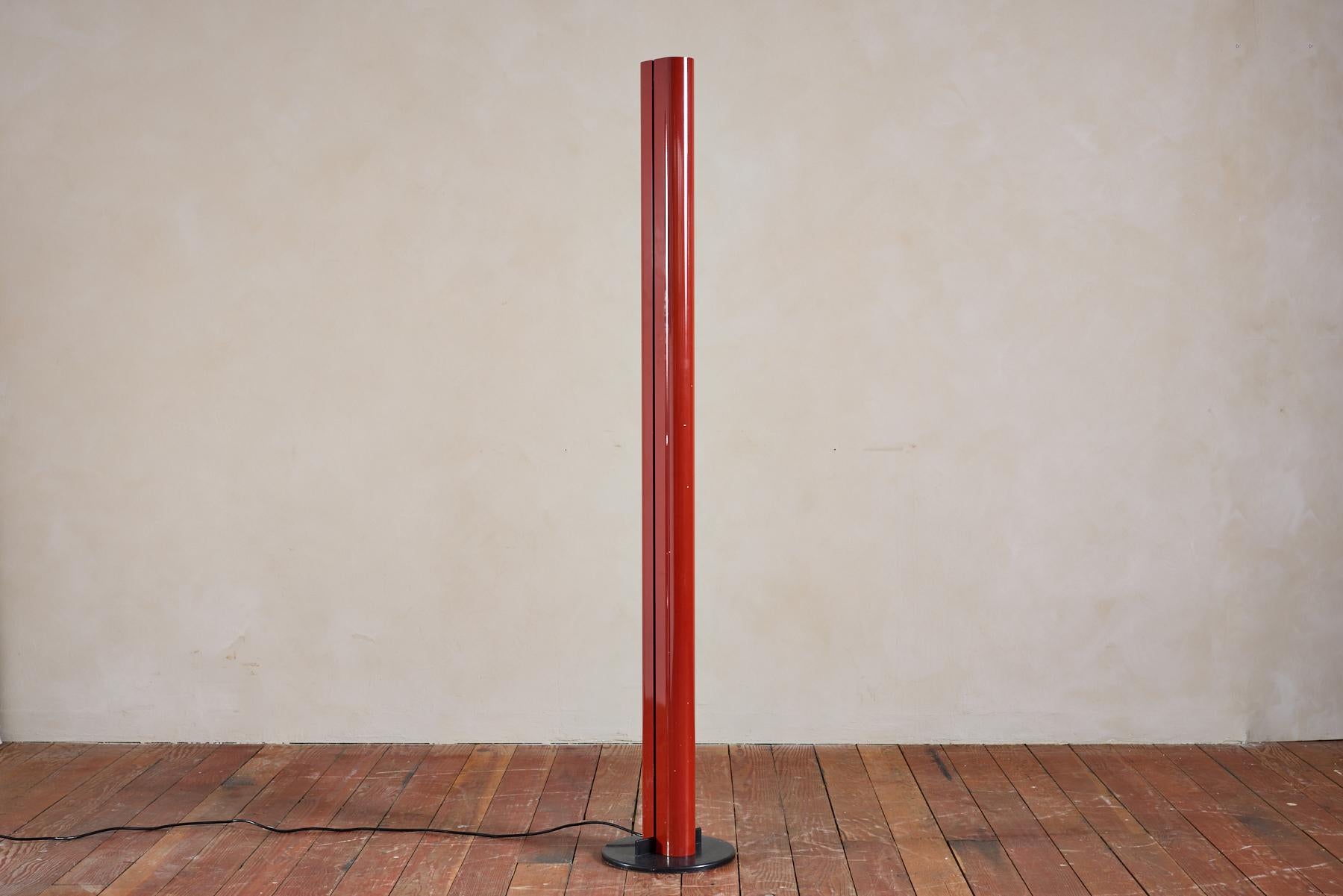 Rare Red lacquered floor lamp by Gianfranco Frattini  
Sleek aluminum structure with interior bulb with cast iron base 
Italy, 1960s

