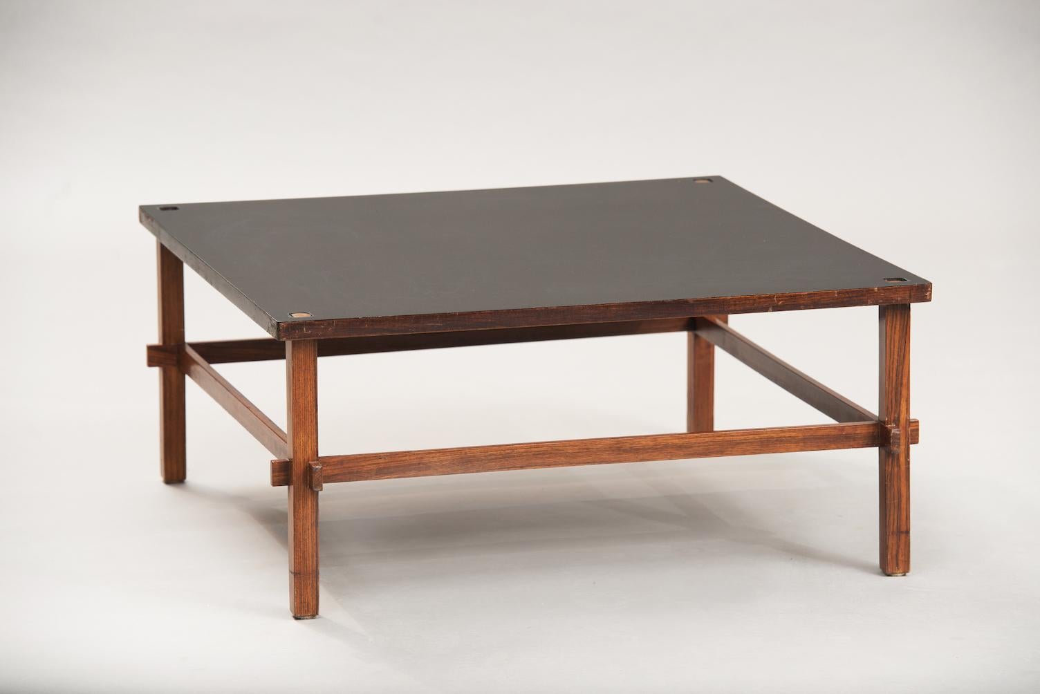 Gianfranco Fratinni rosewood and black Formica reversible top coffee table.
