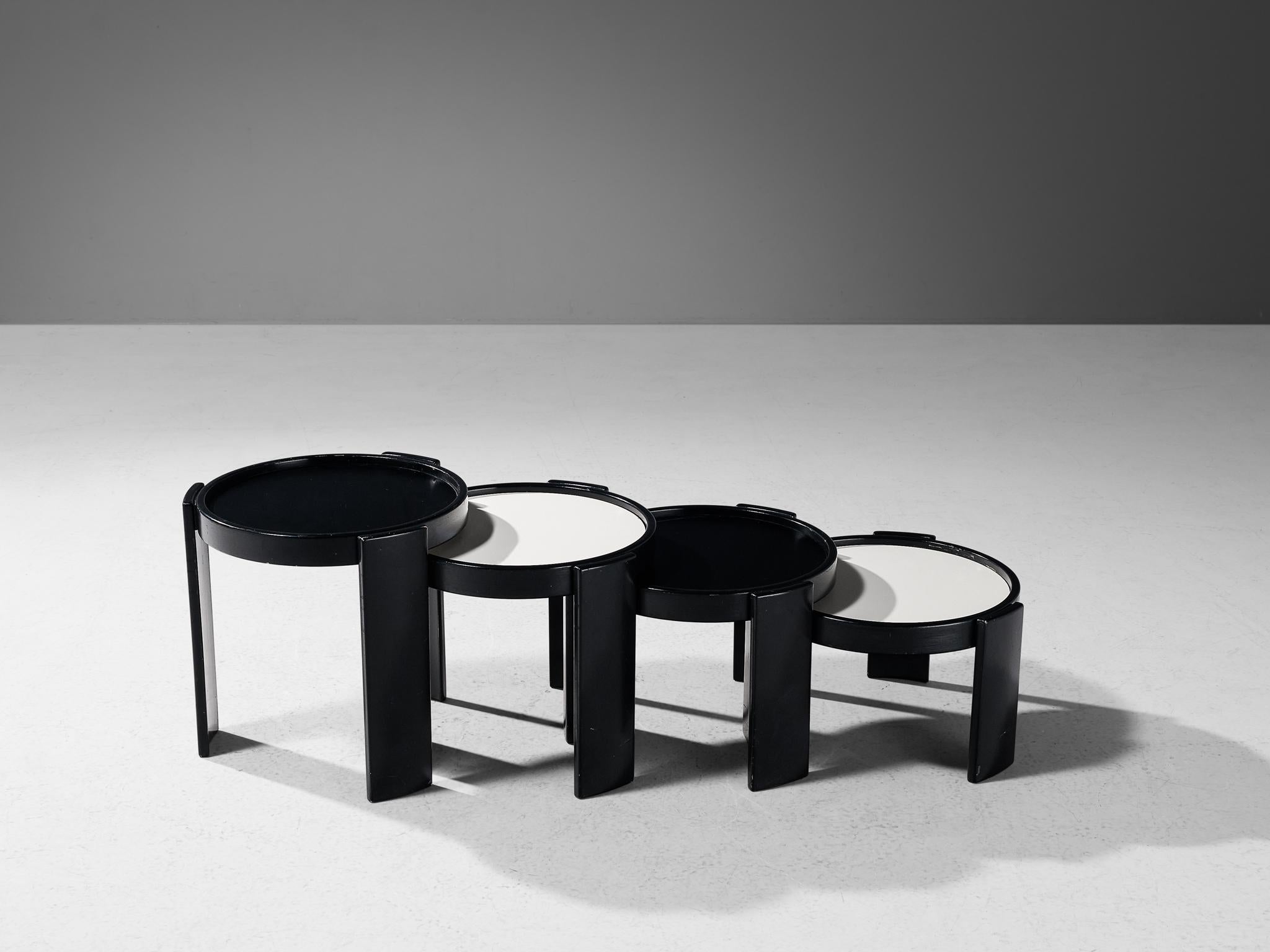 Gianfranco Frattini for Cassina, set of nesting tables, white and black lacquered wood, Italy, 1960s.

These nesting tables are designed by Gianfranco Frattini for Cassina. Half of the tables are white, while the other half is black lacquered wood,
