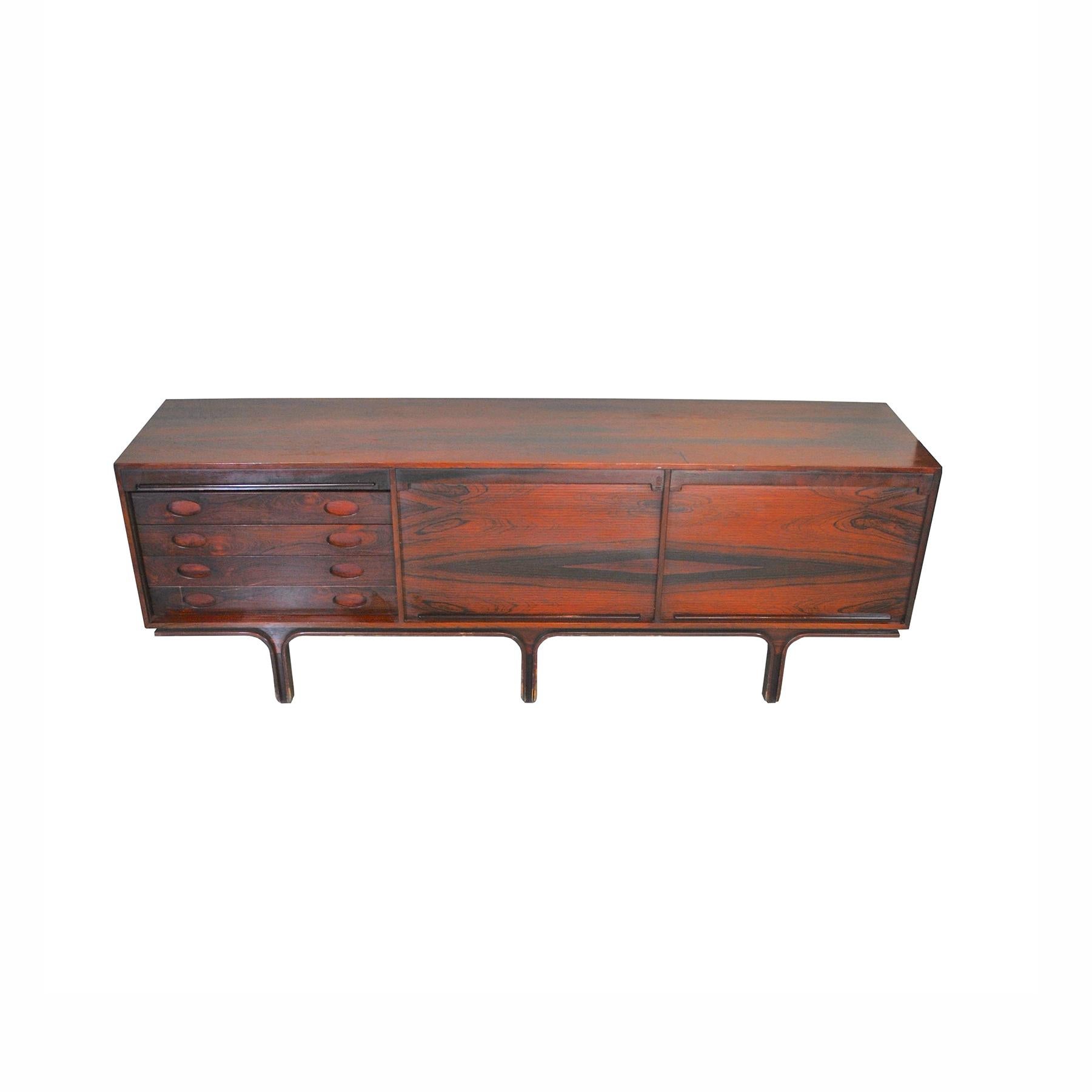 Rosewood sideboard with tambour doors designed by Gianfranco Frattini for Bernini, Italy, 1957. A beautifully designed Mid-Century Modern sideboard with three vertical tambour doors. The sideboard is executed in a magnificent flamed and grained