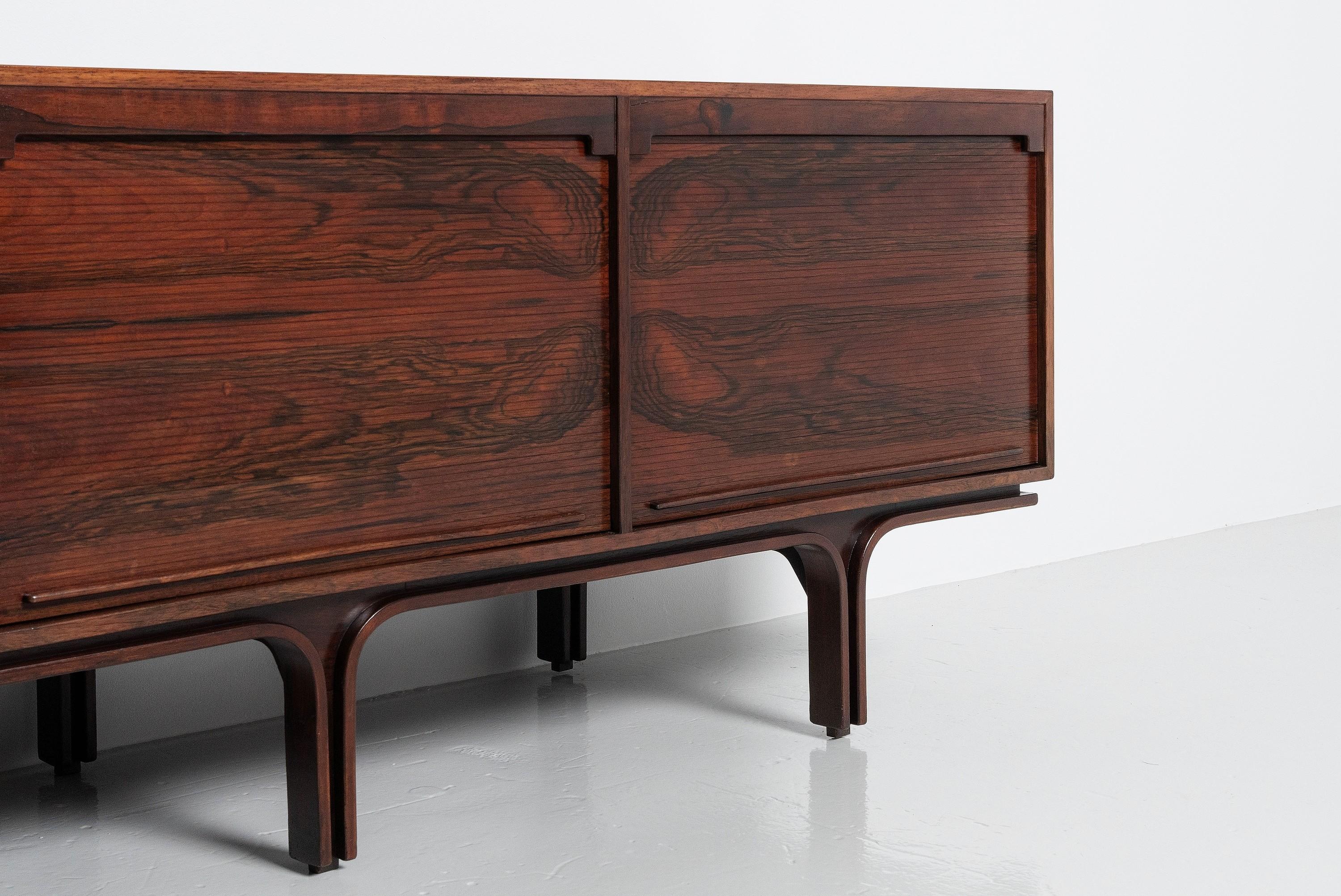 Gorgeous and very highly detailed sideboard designed by Gianfranco Frattini and produced in Italy by Bernini in 1957. This sideboard is still in original condition and has apart from minor surface marks due to it's age, no significant signs of wear.
