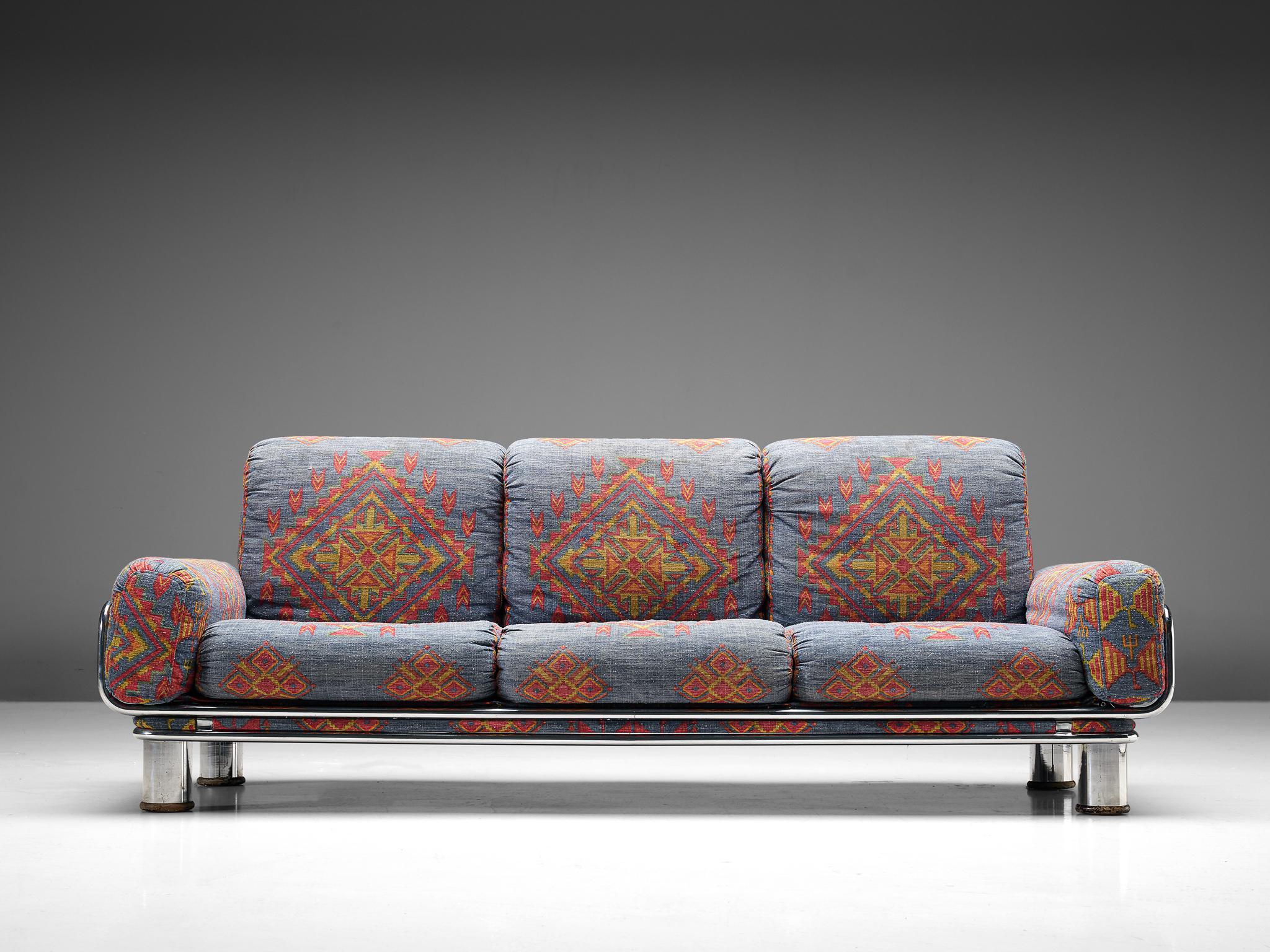 Gianfranco Frattini, three-seat sofa, fabric and chromed metal, Italy, 1970s


A Postmodern three-seat sofa that features bulky shapes. A tubular chromes steel frame forms the base of the sofa. It holds the comfortable and thick cushions inside. 