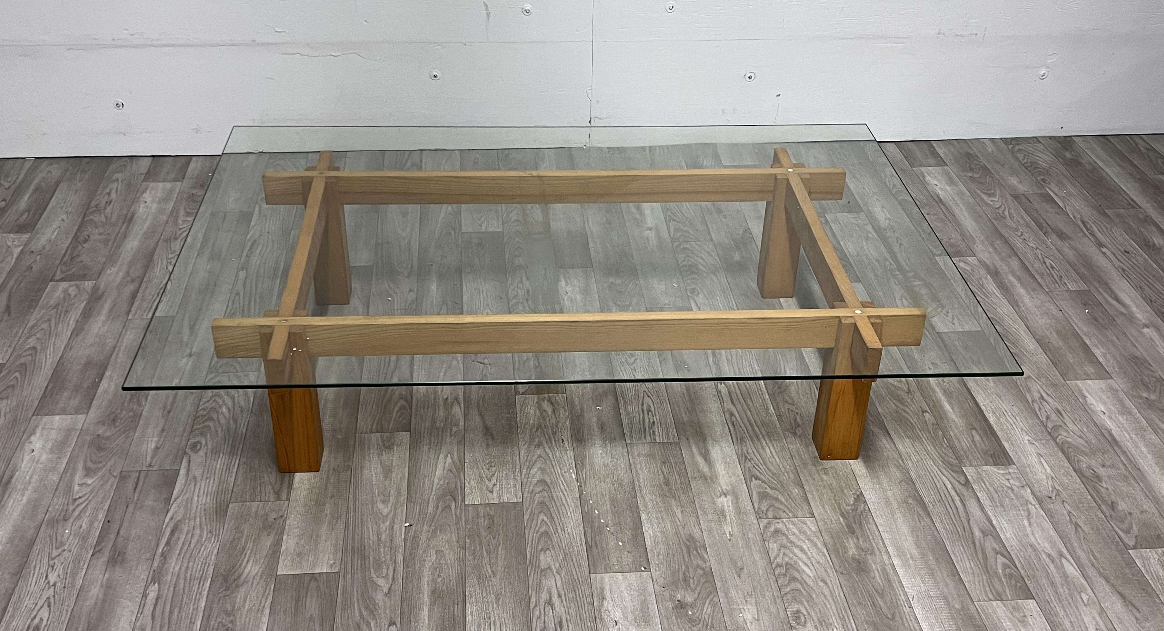 Low wood coffee table with glass top attributed to Gianfranco Frattini
