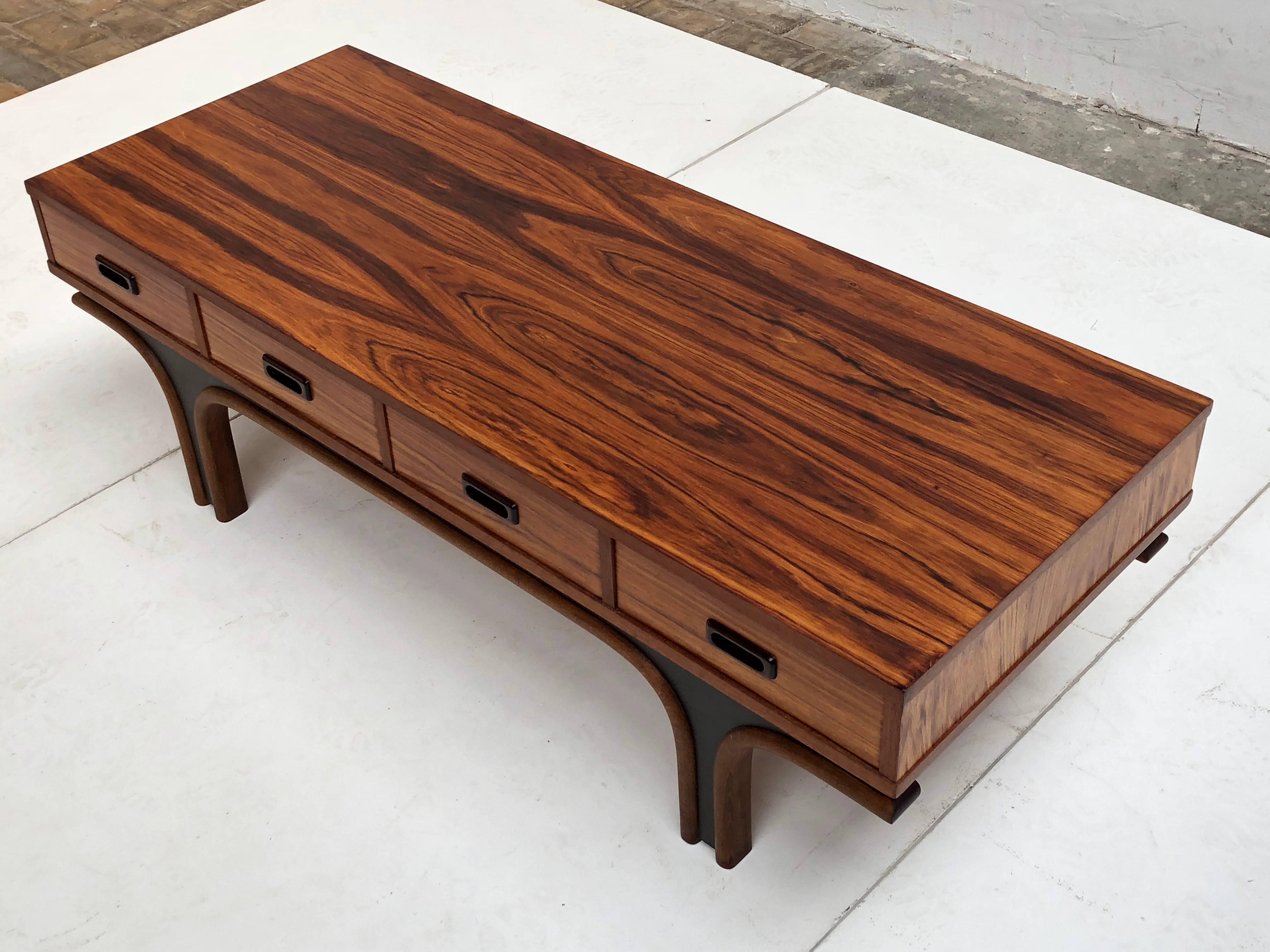 1960's manufactured low table or low credenza with 4 drawers that resembles the designs of Italian designer Gianfranco Frattini

The 4 sliding drawers can be opened from both sides of the table or even be left out if you would like an open look (see