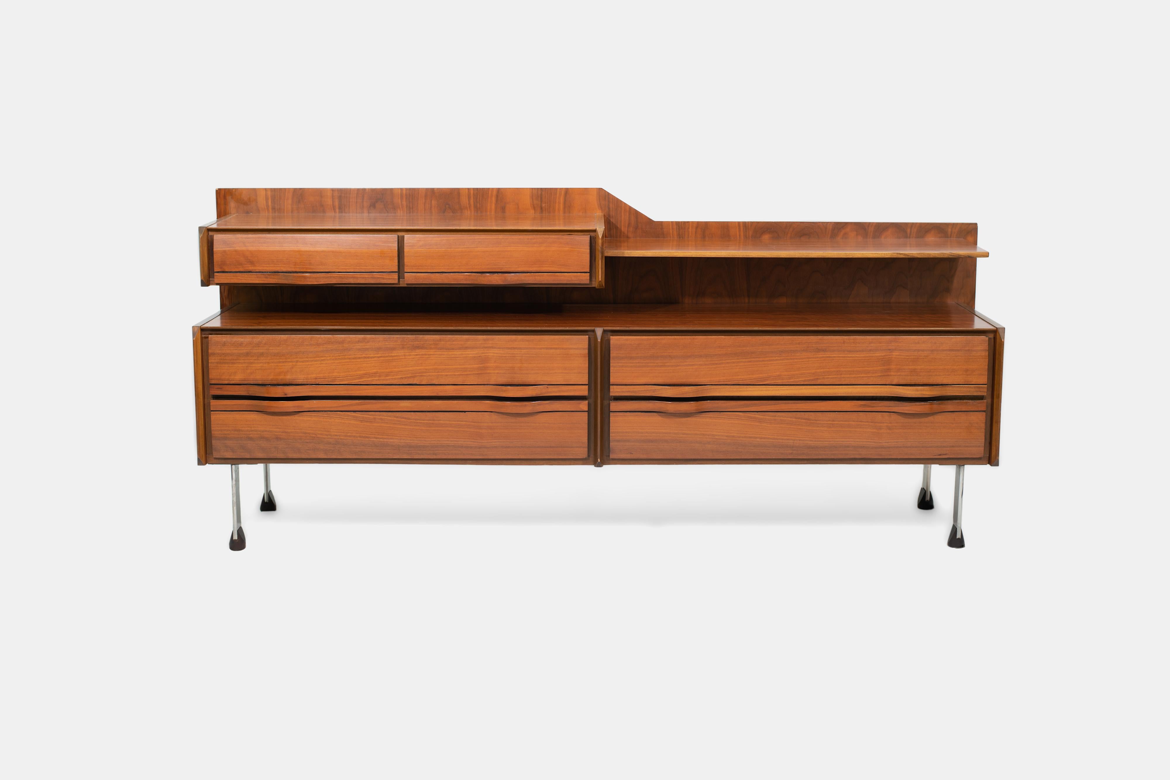 Designed by Gianfranco Frattini in the 1960s and manufactured by La Permanente Mobili in Cantù, Italy, this elegant chest of drawers exemplifies the refined craftsmanship and modern sensibility of postwar Italian design. The clean-lined wooden