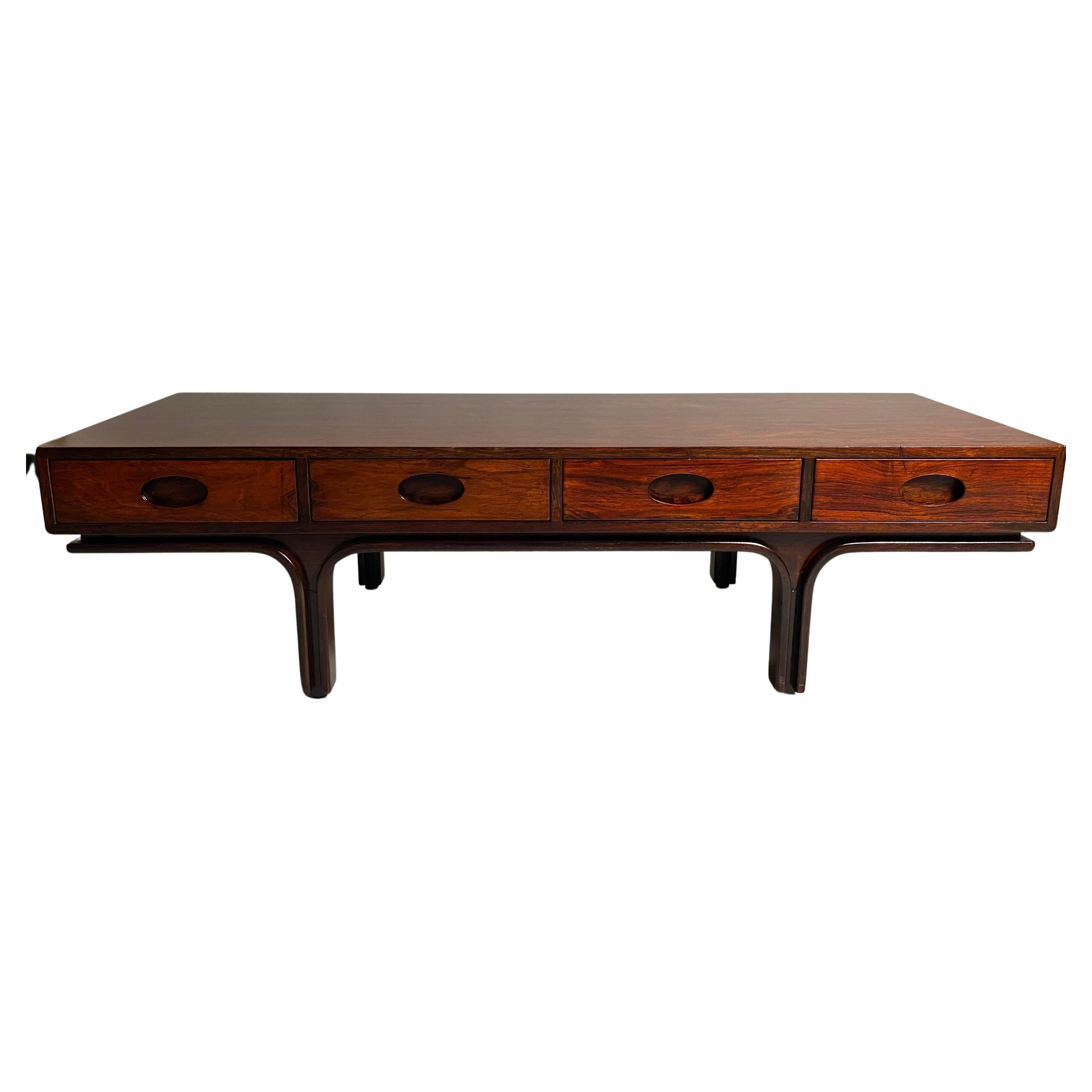 Coffee table created by the famous Italian architect and designer Gianfranco Frattini for the Bernini company. It has 4 comfortable drawers and can also be used as a sideboard. Original Bernini label. The piece of furniture has been re-polished and