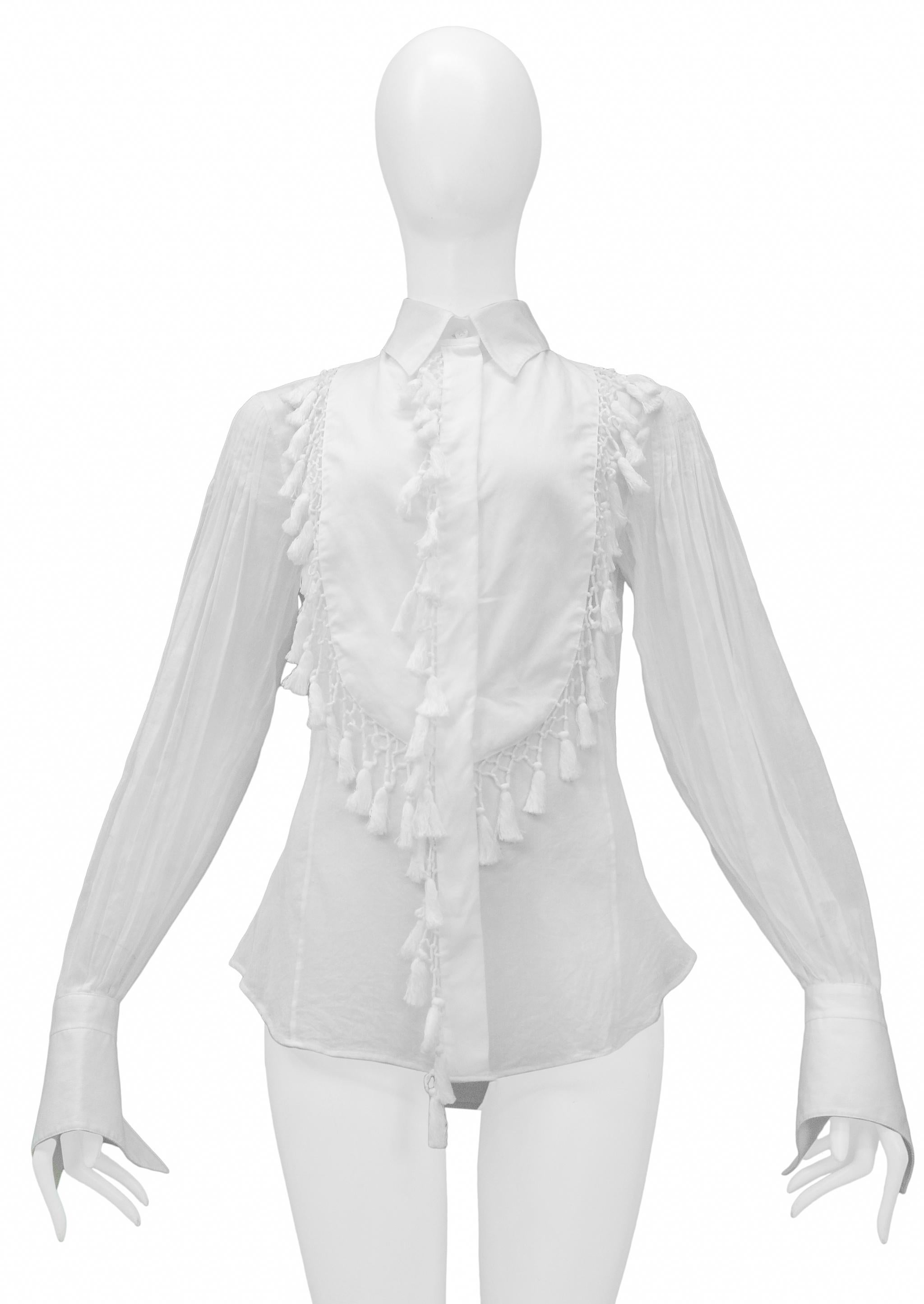 Resurrection Vintage is excited to offer a vintage Gianfranco Ferre white cotton shirt featuring decorative tassels, button front, folding collar, long sleeves, and large cuffs. 

Gianfranco Ferre
Size 40
Cotton    
Excellent Vintage Condition
