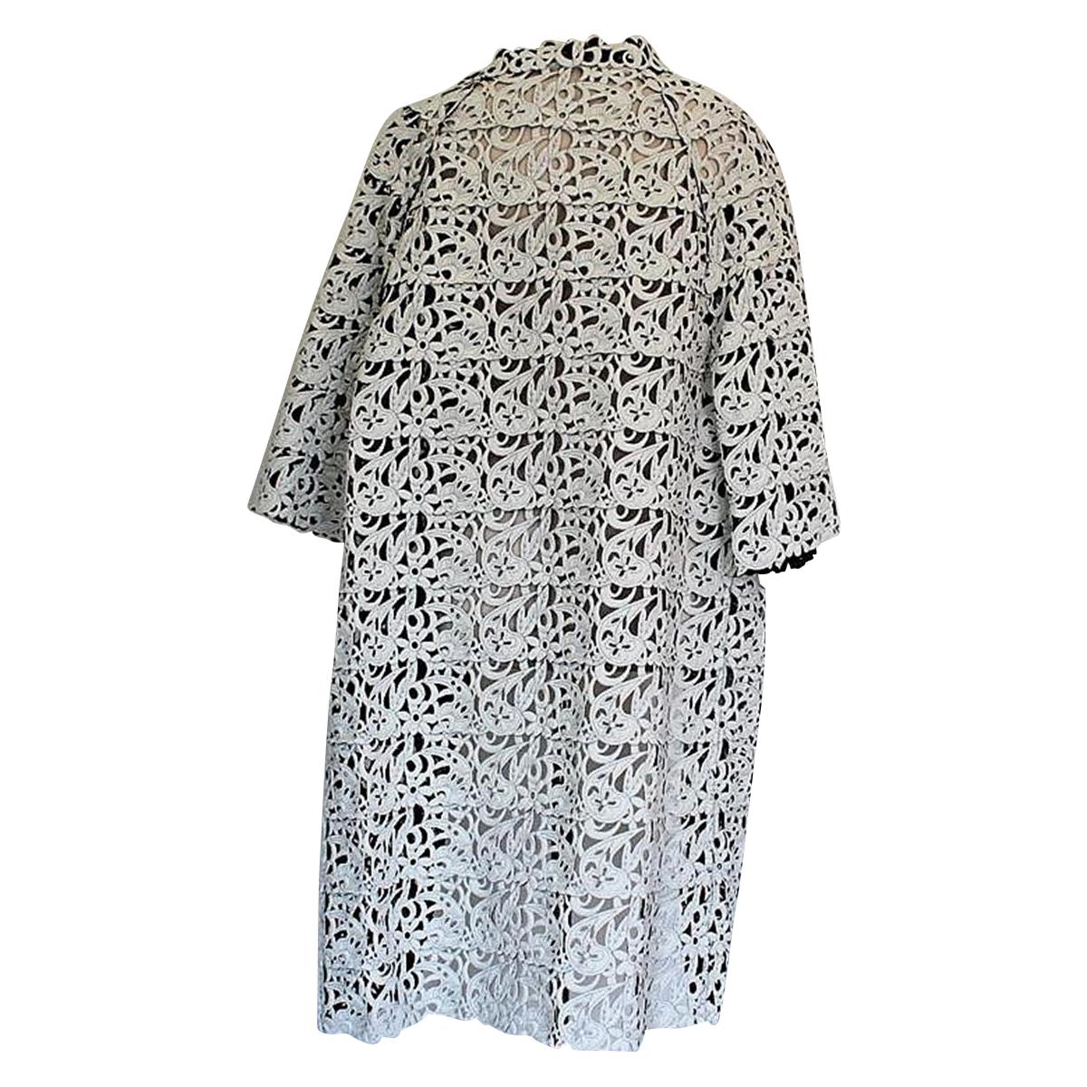Very chic overcoat by Gianluca Capannolo
Beautiful cut & fit
Polyamide (80%) and elasthane (20%)
Black and white
Double face
Floral pattern
3/4 Sleeve
Total length cm 109 (42.9 inches)
Brand new with tags
Worldwide express shipping included in the