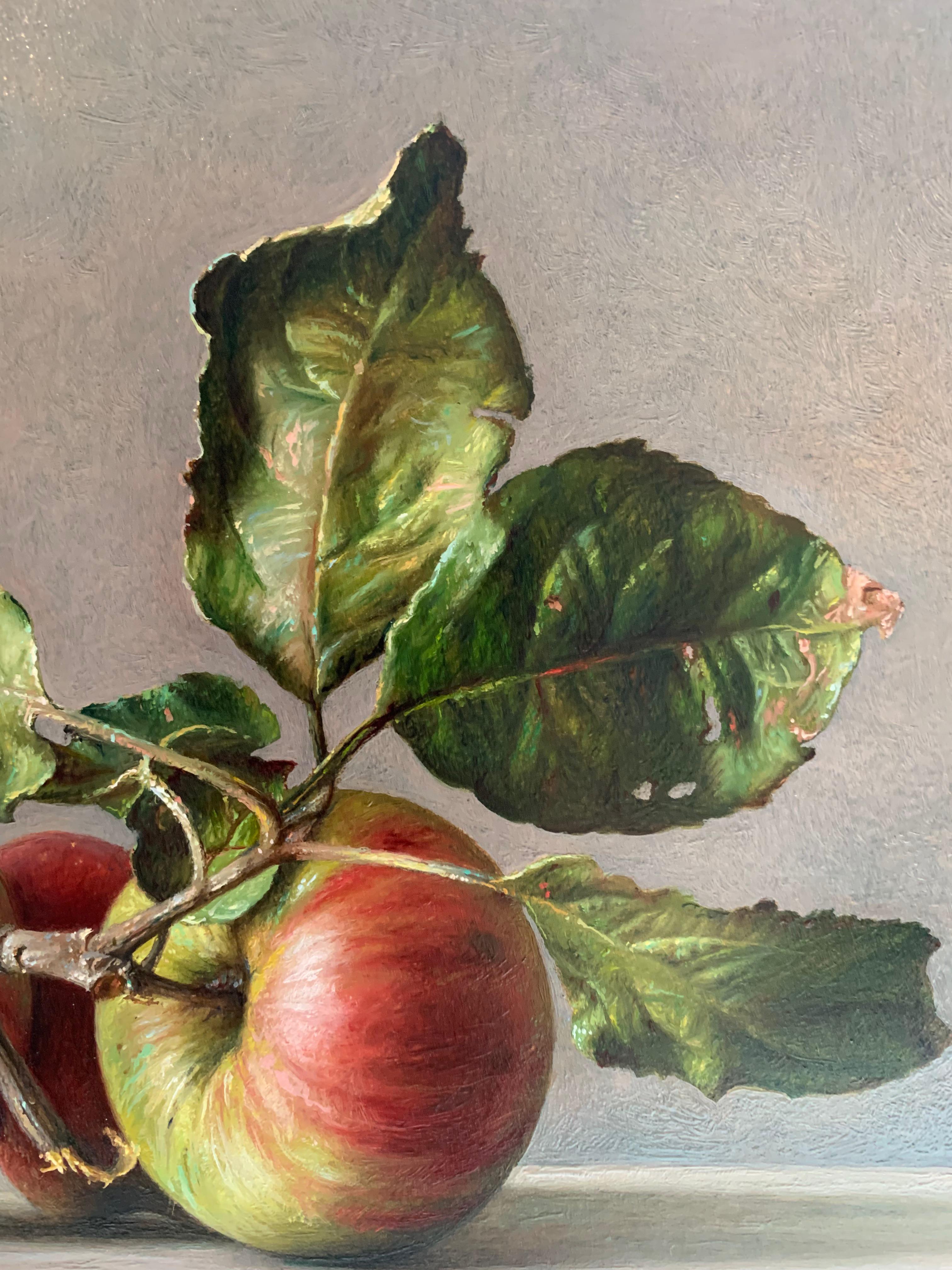 Finely oil painted still life with tiny red-and-green apples on a stone surface - Painting by Gianluca Corona
