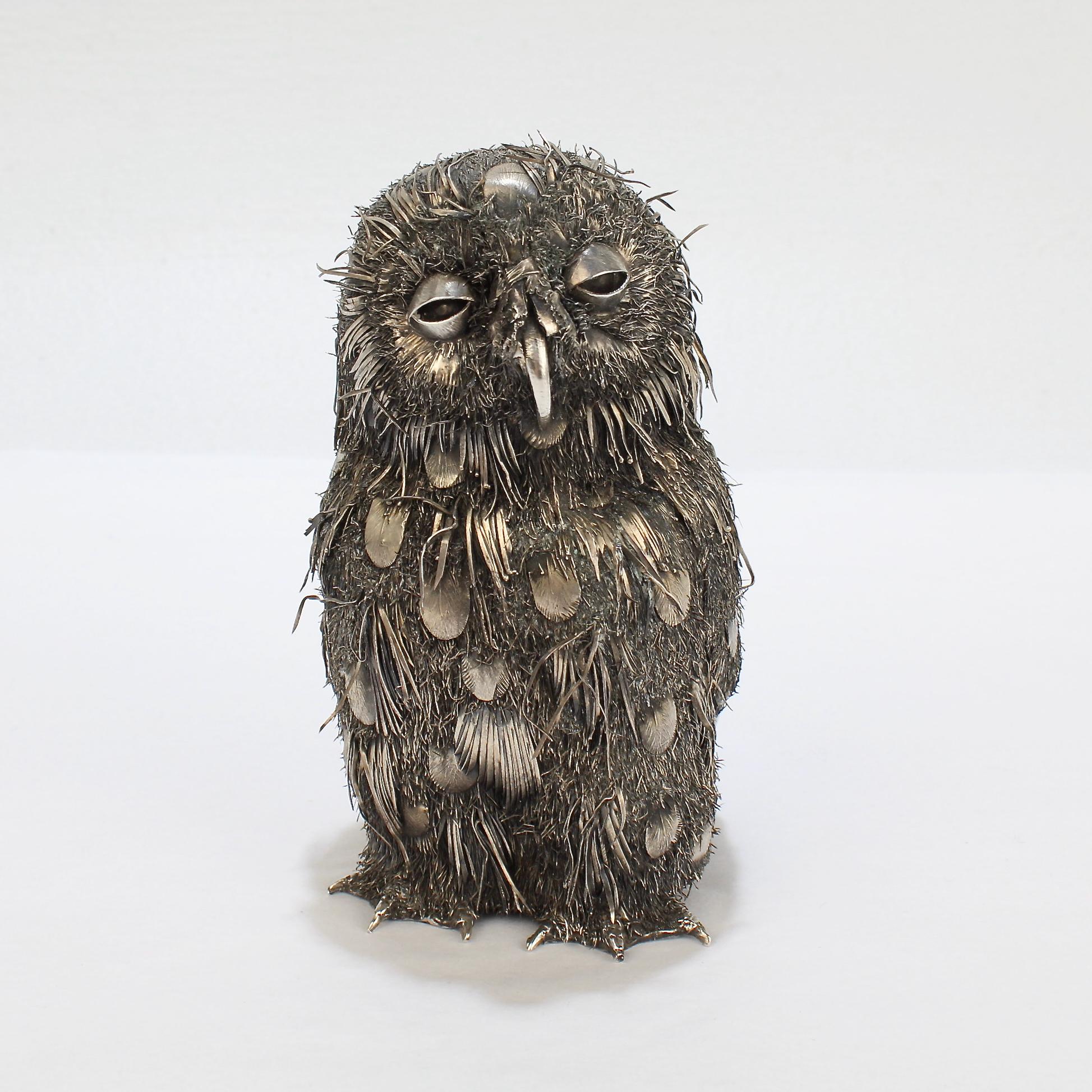 A very fine silver figurine of a fledgling owl. 

Modeled as a sleepy-eyed baby owl in .800 silver by Gianmaria Buccellati.

Simply a wonderful Buccellati sculpture!

Provenance:
Private Hudson, NY Collection
Antique Cupboard

Overall Condition:
It