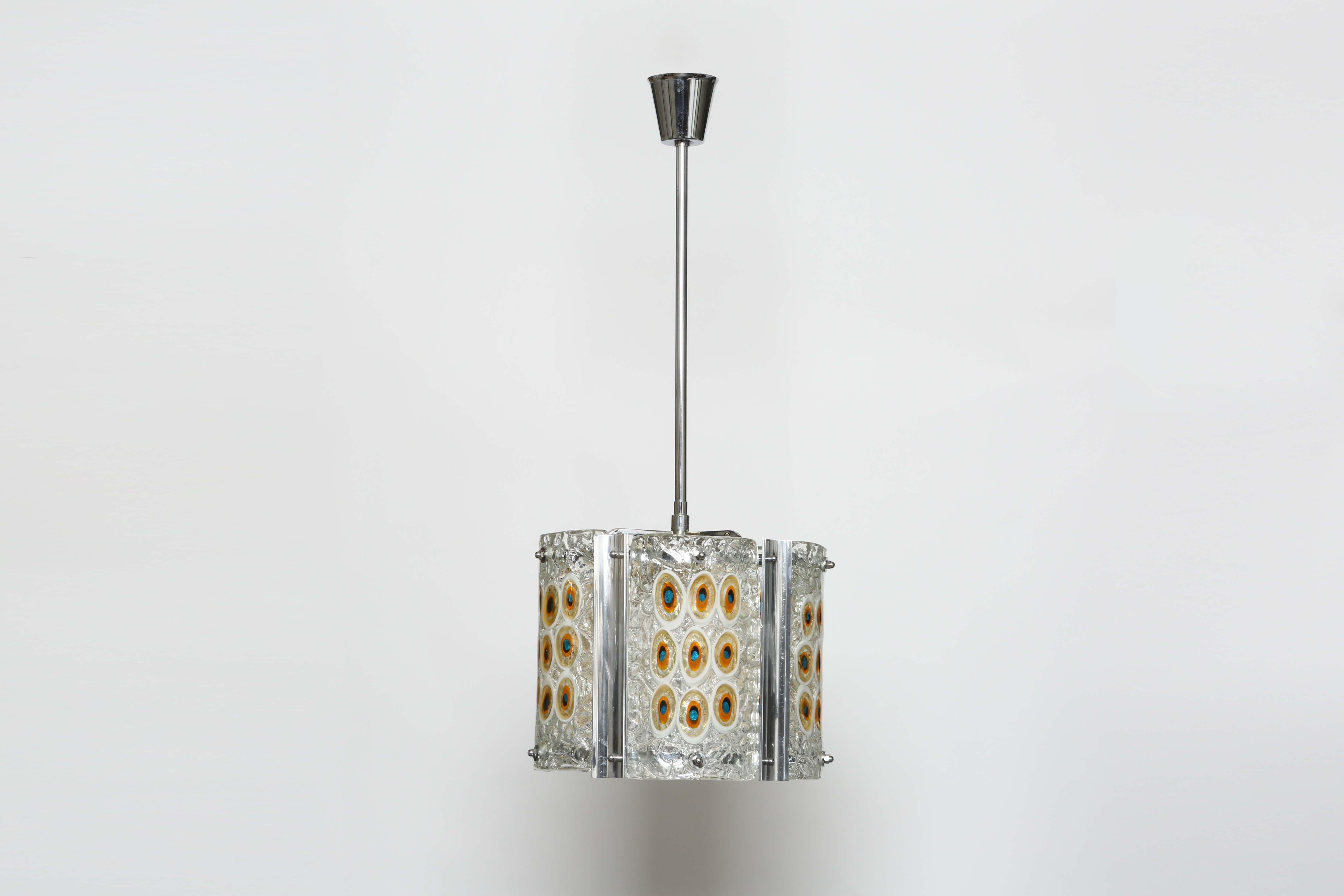 Gianmaria Potenza for La Murrina suspension light, circa 1970s
Designed and manufactured in Italy.
Murano glass, chrome plated metal, metal.
6 candelabra sockets.
Complimentary US rewiring upon request.
Height adjustable.