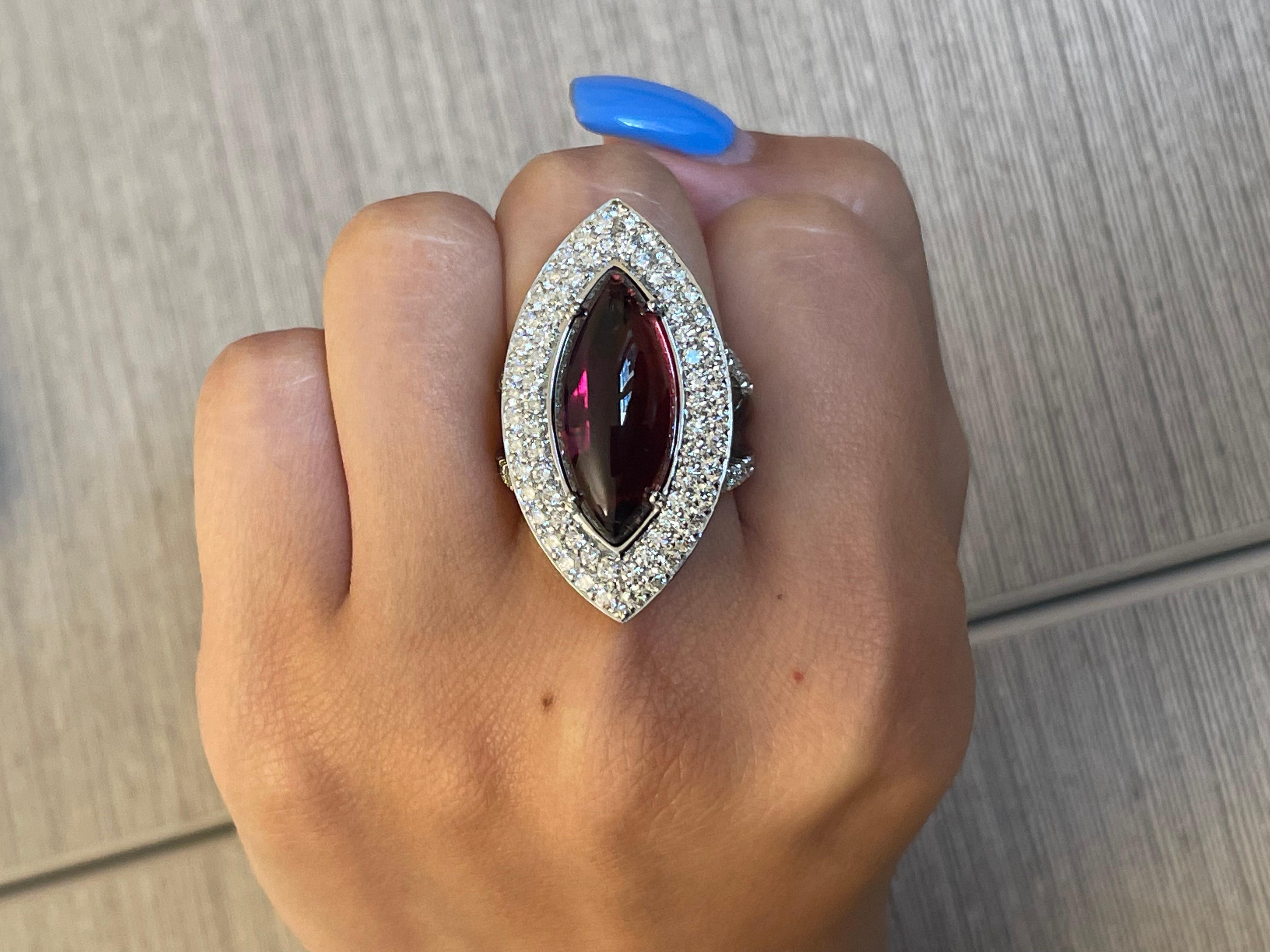 Ring White Gold 18 K Gianni Lazzaro 

Diamonds 86-2,10 ct HSI 
Tourmaline 1-10,93ct.

With a heritage of ancient fine Swiss jewelry traditions, NATKINA is a Geneva based jewellery brand, which creates modern jewellery masterpieces suitable for every