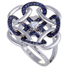 Anillo Gianni Lazzaro de oro blanco de 18 quilates con diamantes y zafiros calados con pavé