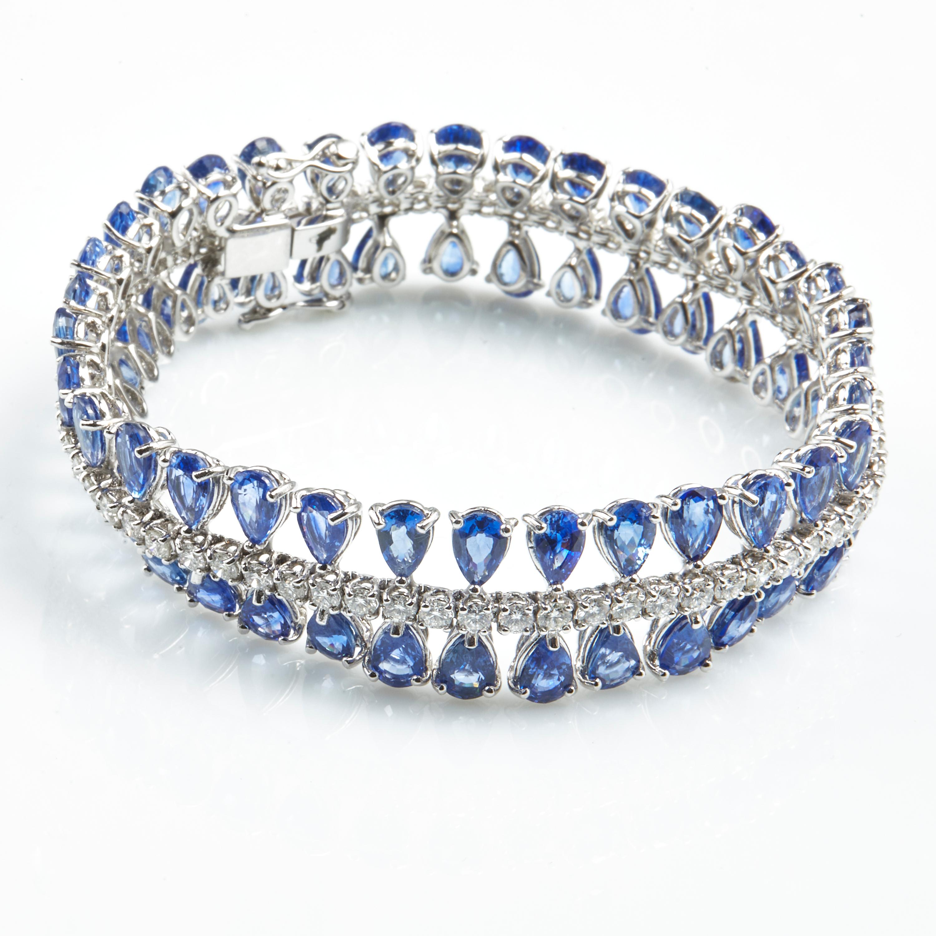 Bracelet White Gold 18 K Gianni Lazzaro

Diamonds 68-03,86 ct HSI 
Blue Sapphire 68- 32,69ct.

With a heritage of ancient fine Swiss jewelry traditions, NATKINA is a Geneva-based jewelry brand that creates modern jewelry masterpieces suitable for