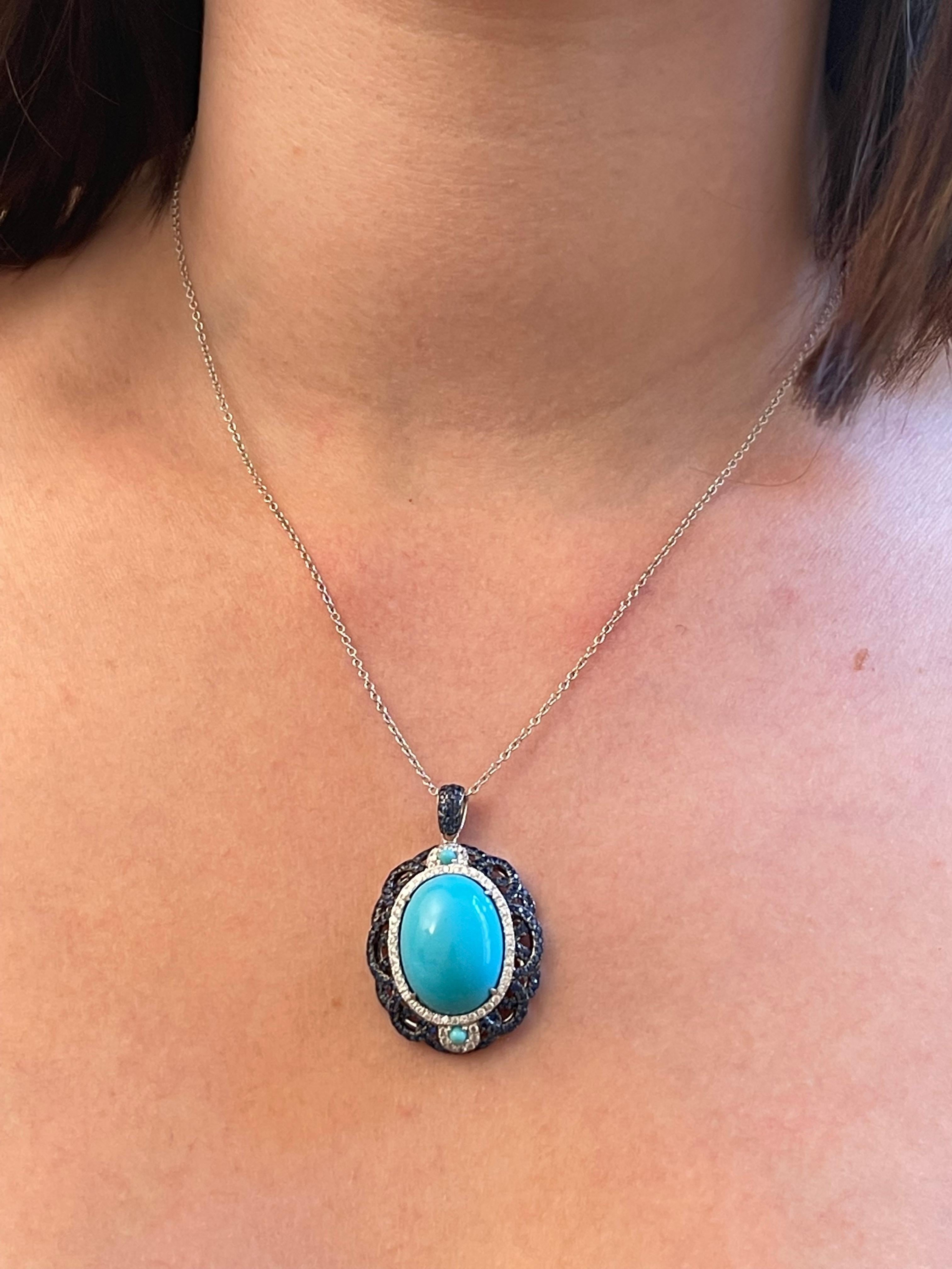 Pendant White Gold 18 K Gianni Lazzaro 

Diamonds 50-0,50 ct HSI 
Blue Sapphire 123-1,23ct
Turquoise  2-0,23ct
Turquoise  1-12,23ct

With a heritage of ancient fine Swiss jewelry traditions, NATKINA is a Geneva-based jewelry brand that creates