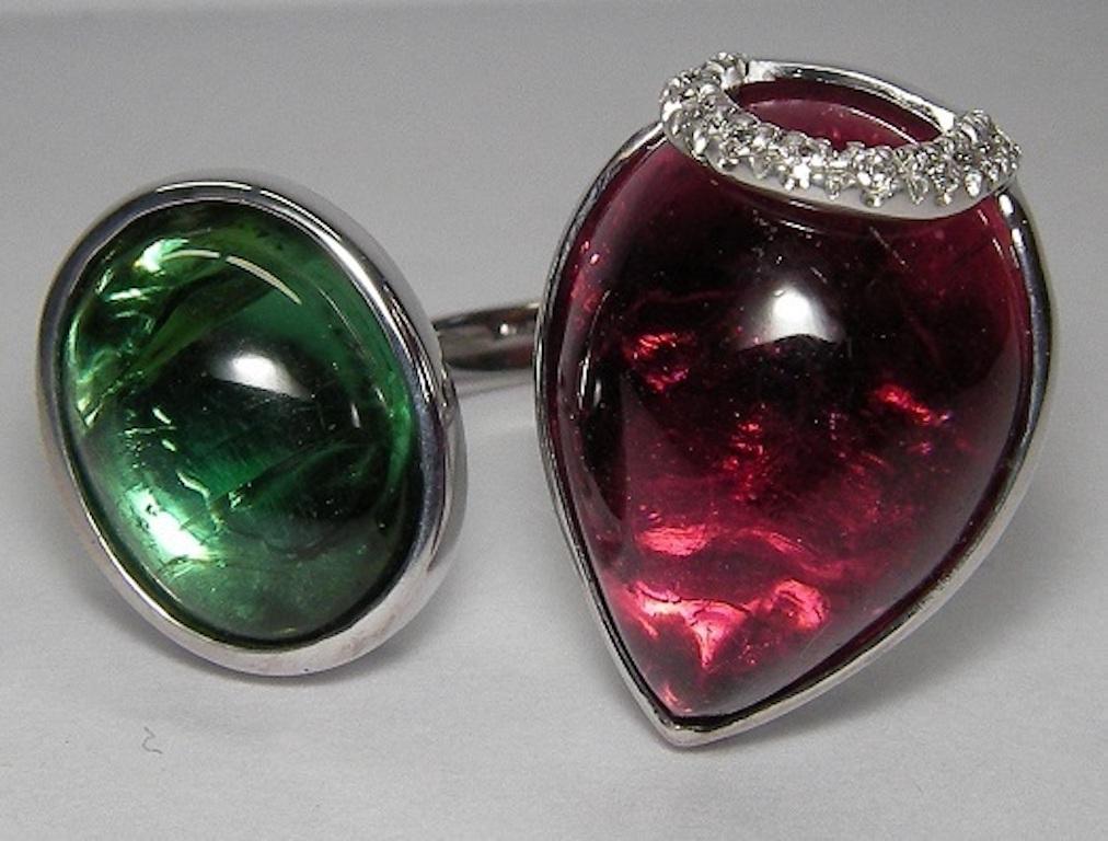 Ring White Gold 18 K Gianni Lazzaro (Matching Earrings Available)

Diamonds 11-0,06 ct HSI 
Tourmaline Green Cabochon 1-10,09ct
Tourmaline Cherry Cabochon 1-4,20ct
Weight 11,40 gram

With a heritage of ancient fine Swiss jewelry traditions, NATKINA