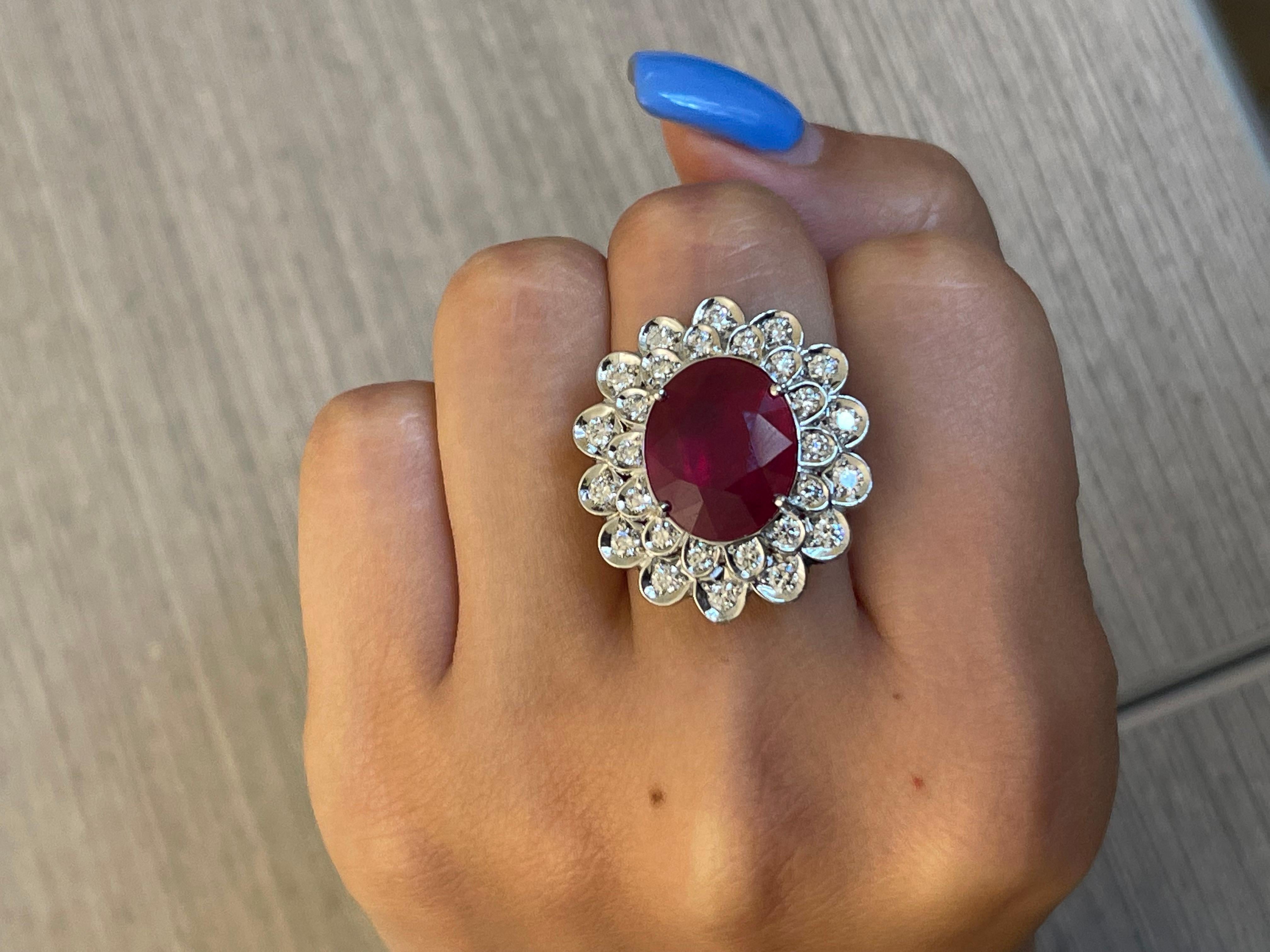 Ring White Gold 18 K Gianni Lazzaro (Matching Earrings Available)

Diamonds 28-1,09 ct HSI 
Ruby 1-9,58ct.

With a heritage of ancient fine Swiss jewelry traditions, NATKINA is a Geneva-based jewelry brand that creates modern jewelry masterpieces
