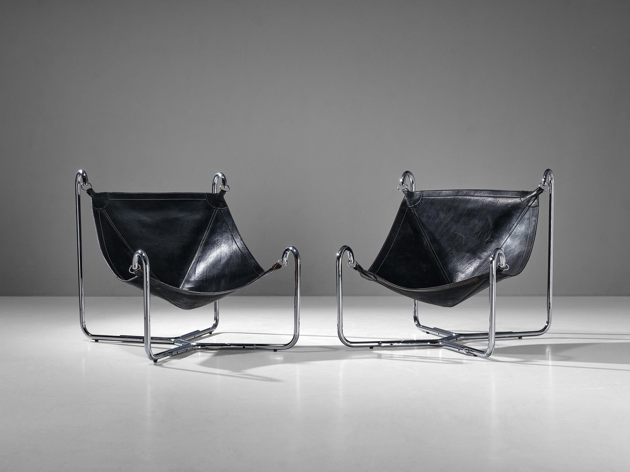 Gianni Pareschi and Ezio Didone for Busnelli, pair of 'Baffo' lounge chairs, chromed metal, leather, Italy, design 1969

These 'Baffo' lounge chairs by Italian duo Gianni Pareschi and Ezio Didone are designed in 1969, and produced by Busnelli. They