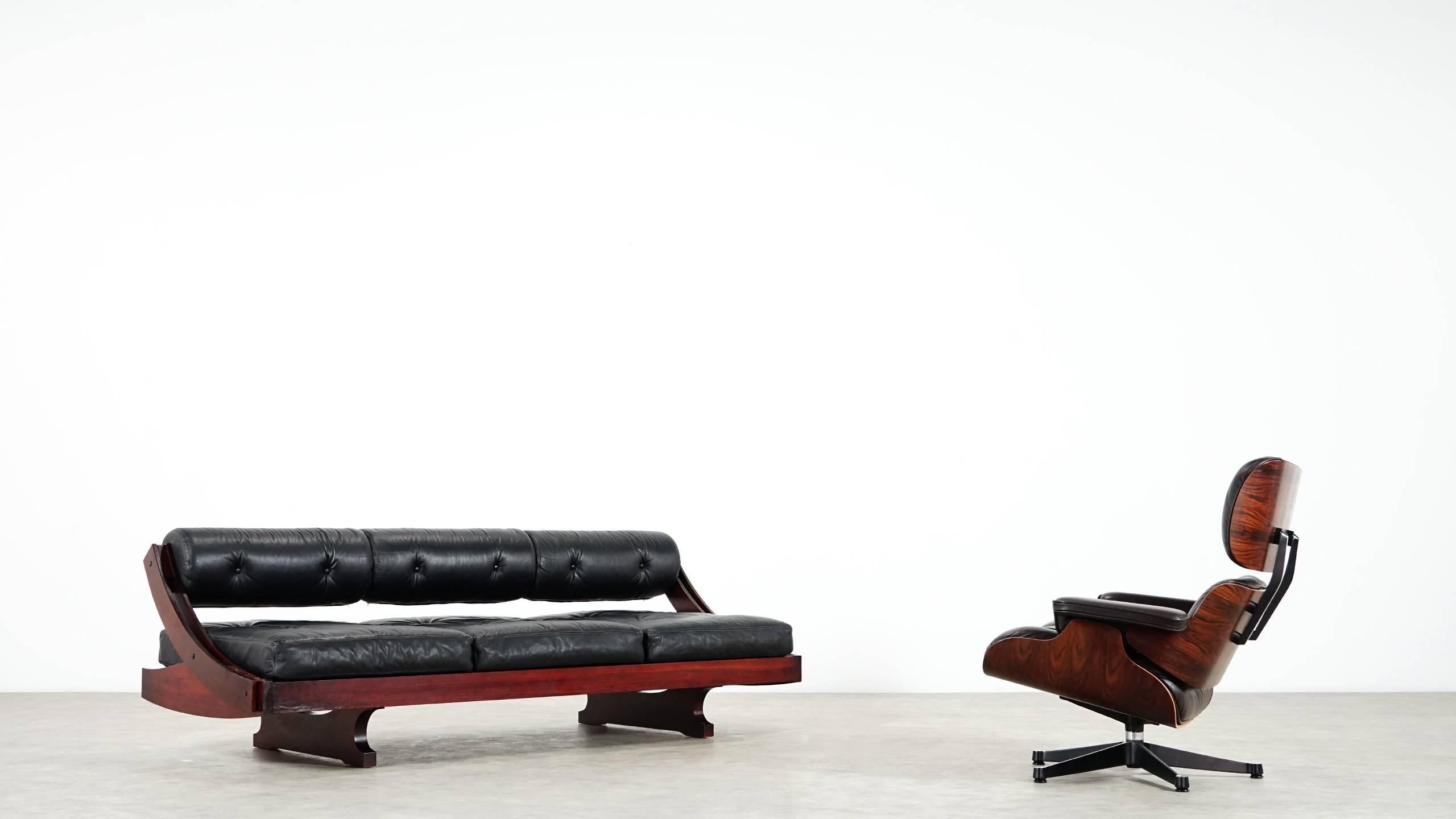 Gianni Songia, daybed GS 195 and sofa
1963 for Sormani, Italy.

Elegant black leather version of the famous Gianni Songia Daybed.
The backrest can be adapted to make it a daybed.
Nice vintage condition!

Dimensions:
W 78.74 inch, H 23.62