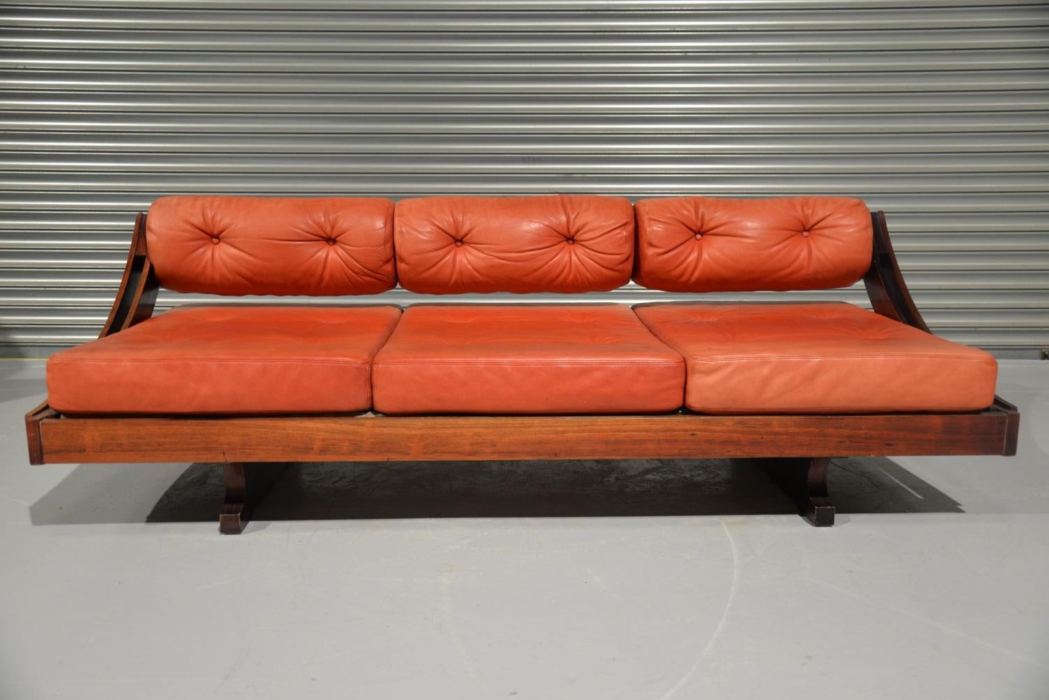 Discounted airfreight for our US and International customers (from 2 weeks door to door).

We are delighted to bring to you an extremely rare Italian daybed designed by Gianni Songia for Sormani in 1963. The elegant frame is built from rosewood, can