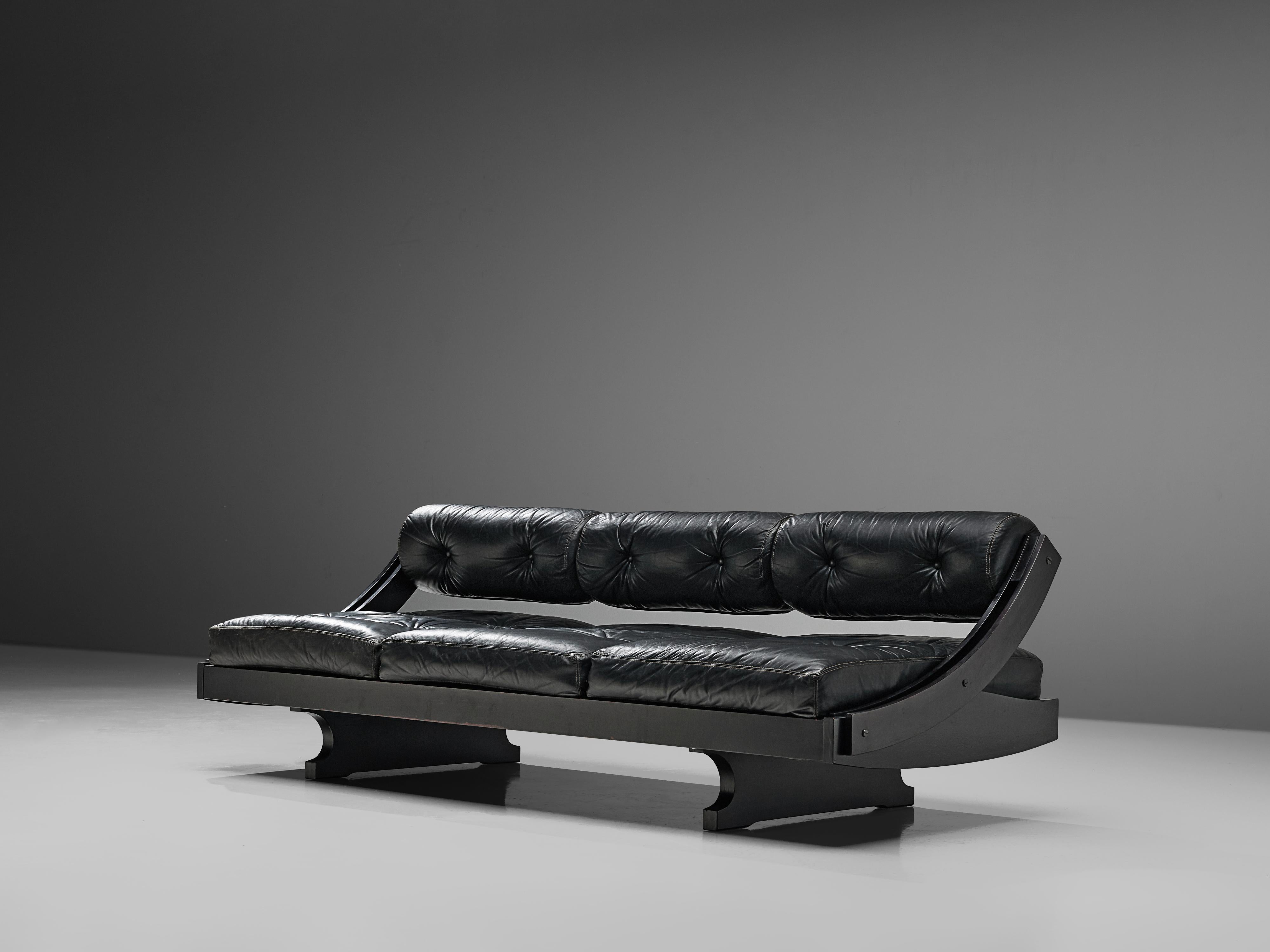 Gianni Songia for Sormani, sofa or daybed model 'GS-195', leather, lacquered wood, Italy, 1963.

Very elegant and organic frame with lush cushions upholstered in black leather. The sofa could be converted into a daybed via a sliding backrest. The