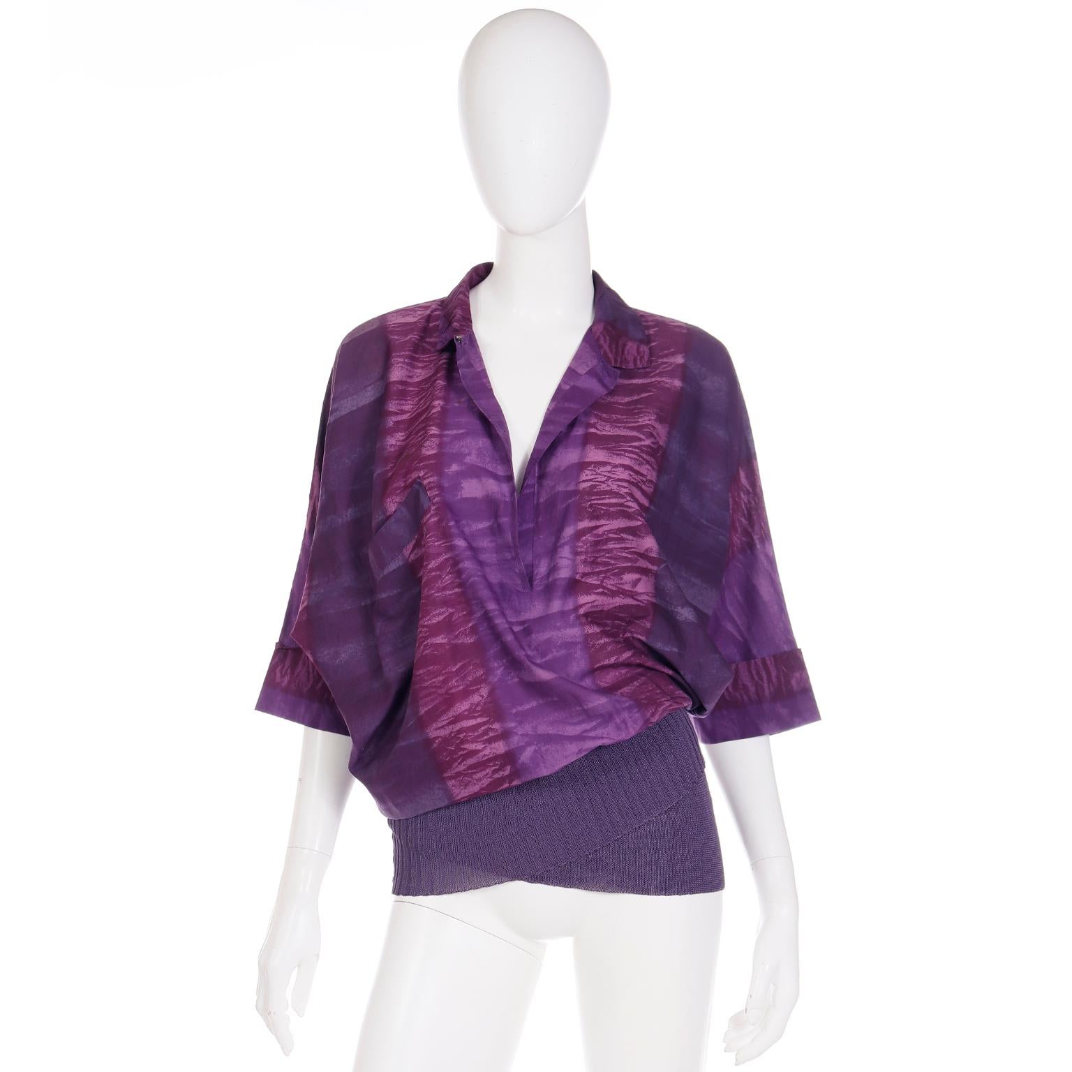 This rare vintage piece from Gianni Versace is an asymmetrical top in a fun abstract purple print. What makes this shirt special is the overlapping asymmetrical stretch knit hem! Such a unique technique that adds so much style to the top! There are
