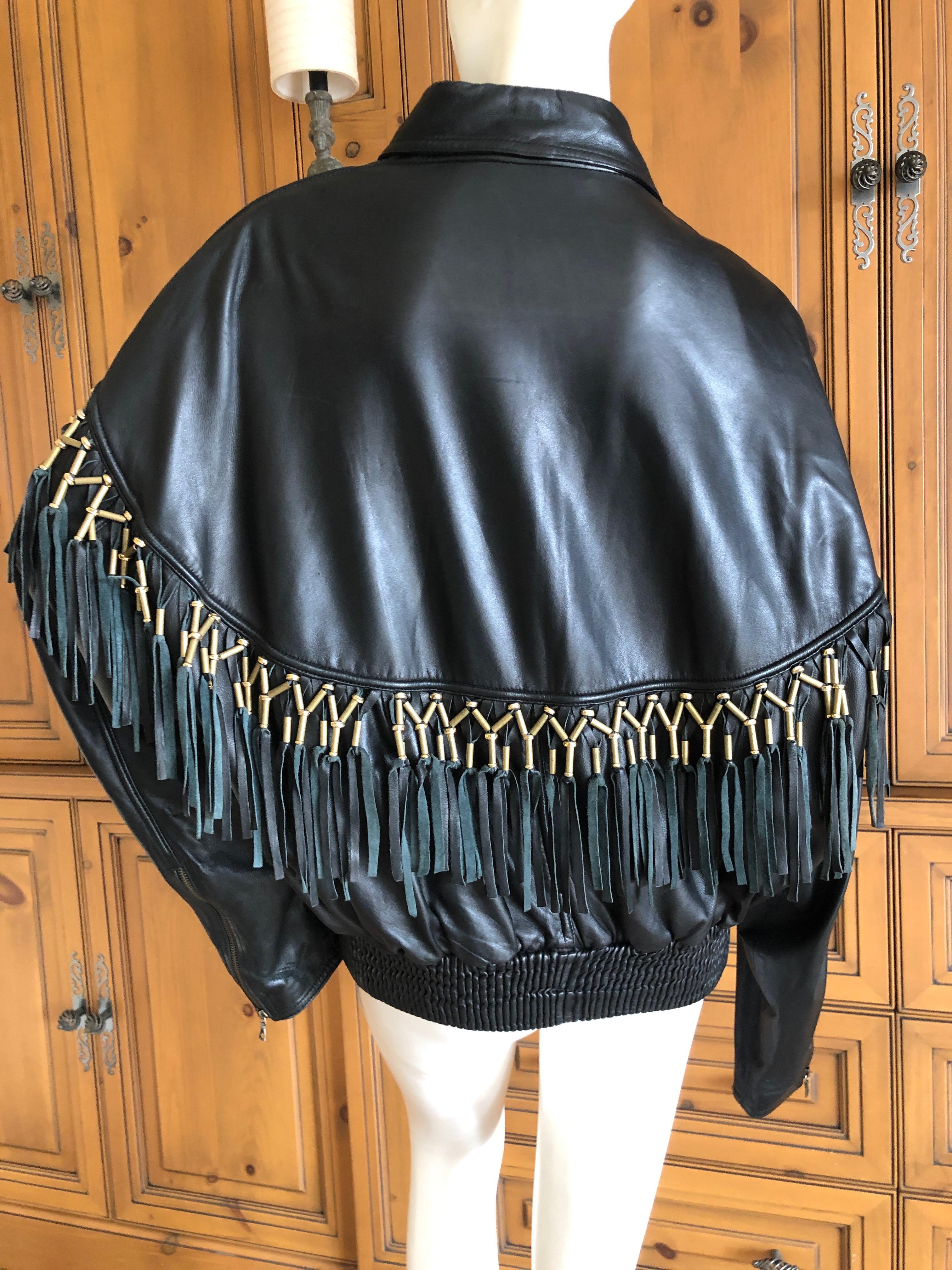 Gianni Versace 1984 Lambskin Leather Men's Jacket with Beaded Fringe.
Wonderful soft black leather jacket with zip front , two pockets and brass beaded fringe.
In great pre owned condition, there are some minor surface markings, see last photos
The