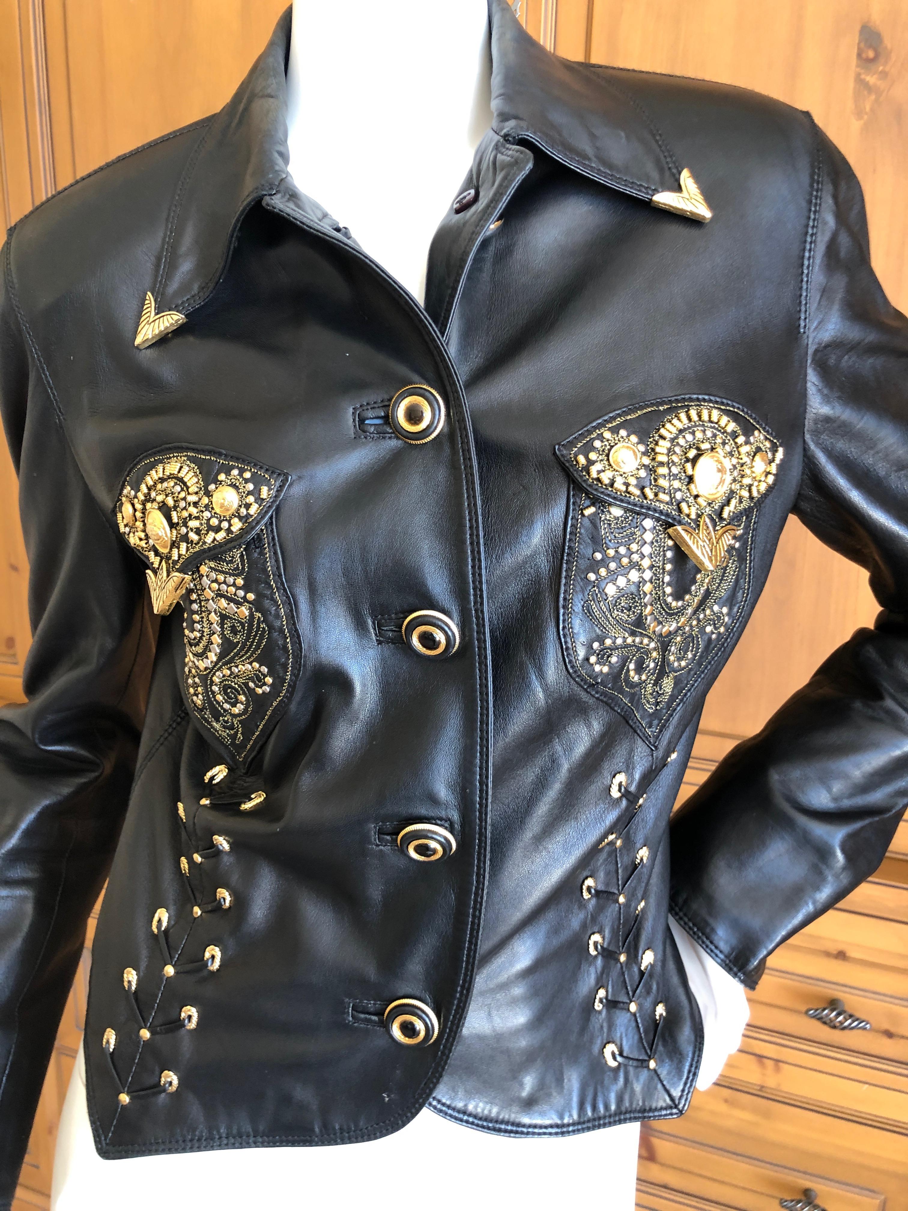 Gianni Versace 1990 Lambskin Lace Up Leather Moto Jacket with Gold Embellishment.
This is so amazing, please use the zoom feature to see the details.
Corset lacing on the sides are laced through gold plated grommets.
 In Excellent Condition. 
Bust
