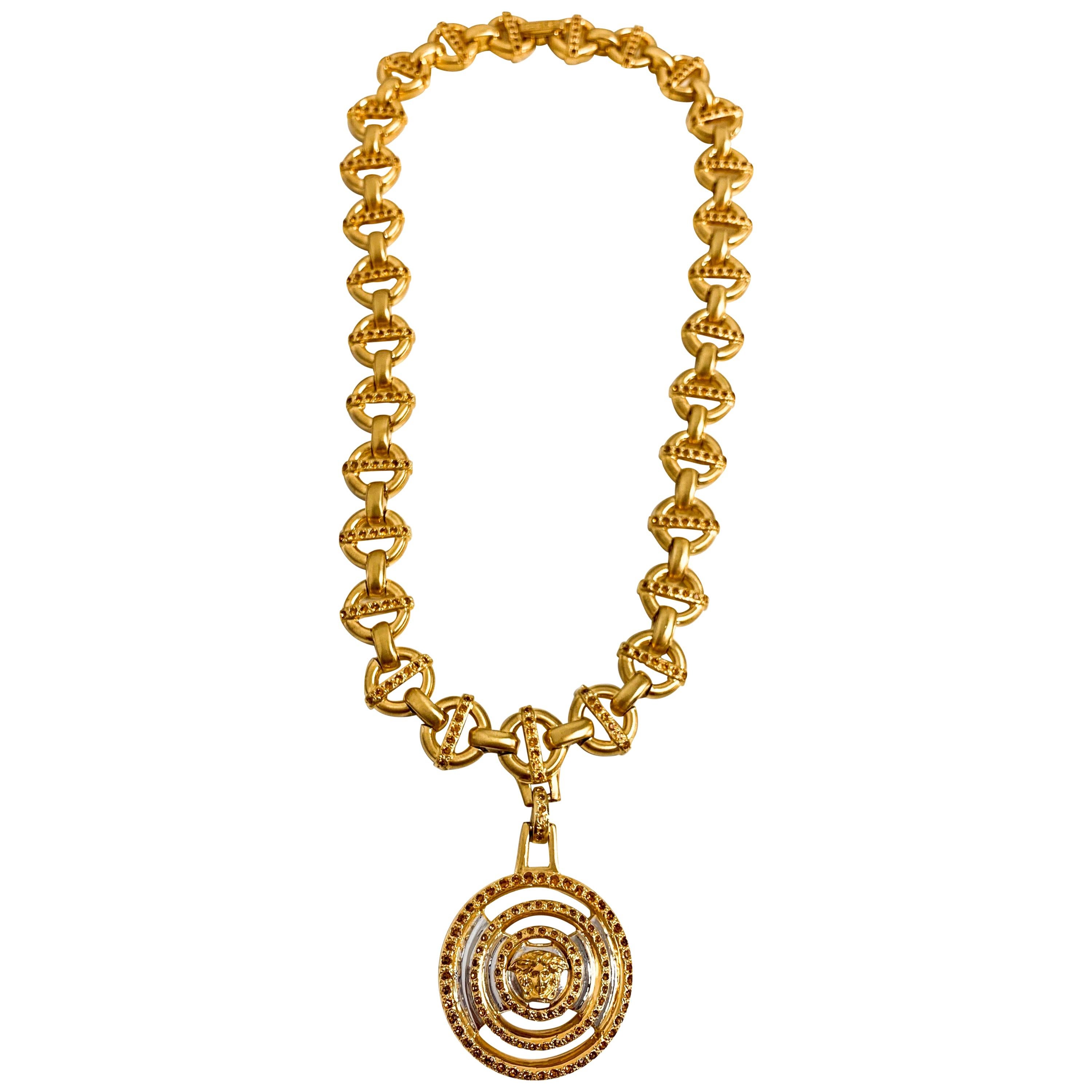 Gianni Versace 1990s necklace with circular medusa head pendent  For Sale