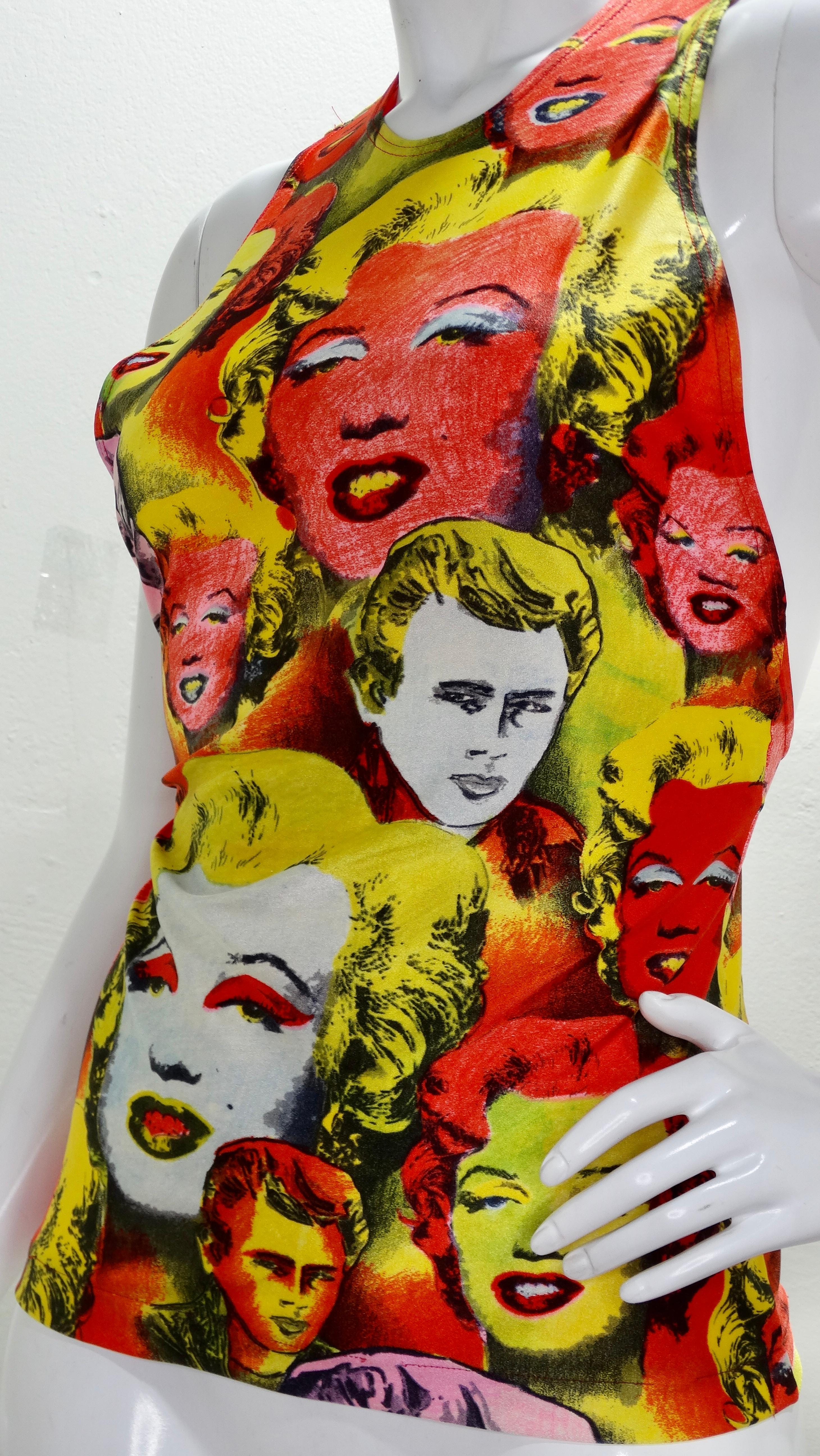 Snag yourself a piece from the Versace archives! Circa 1991 from Gianni's Warhol collection, this spandex tank top is a rare find and features a pop art motif of pop culture icons Marilyn Monroe and James Dean. Includes deep razor back and three