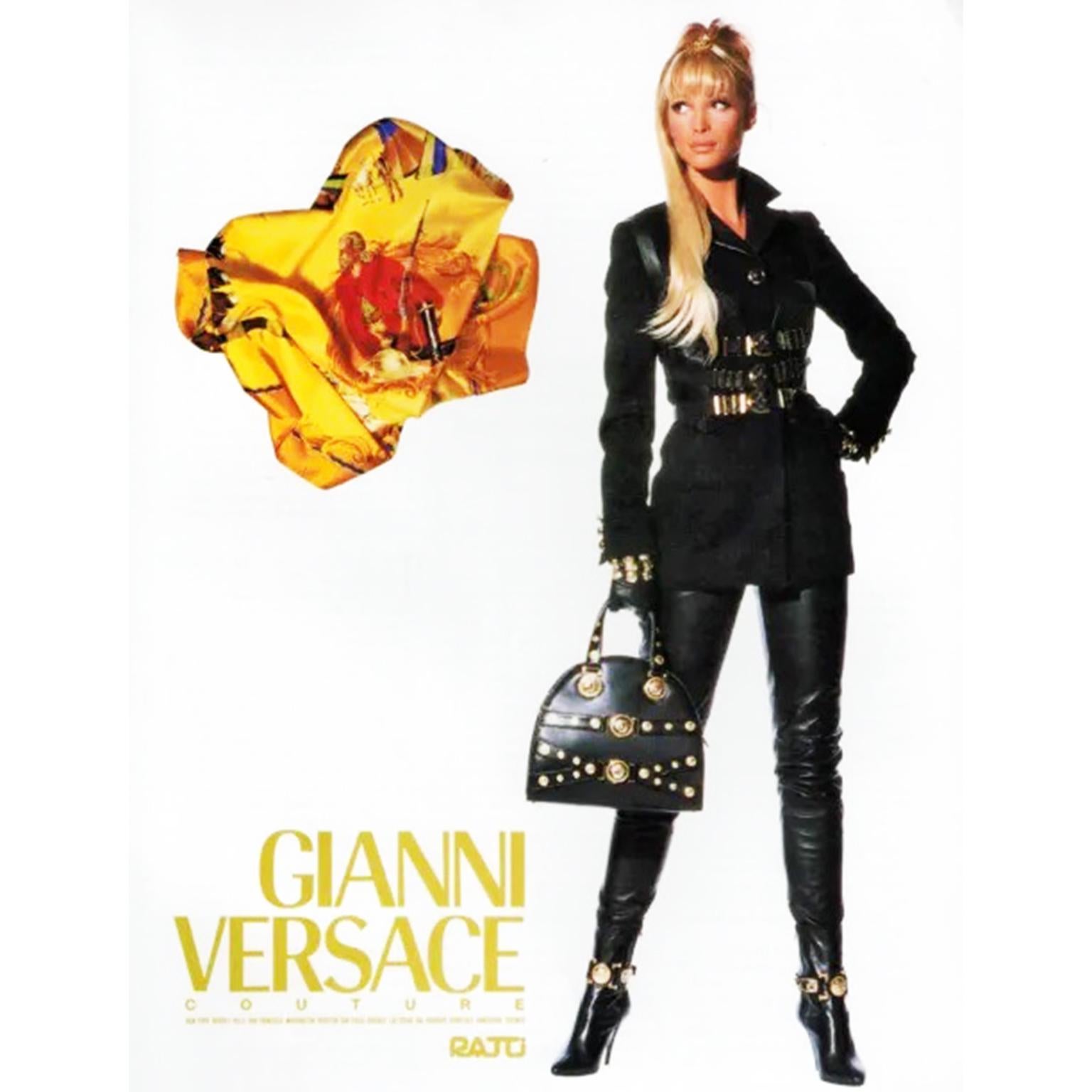 This iconic Gianni Versace vintage black leather satchel style handbag is from the Versace original F/W 1992 Miss S & M or Bondage Collection. Though Donatella Versace did a tribute collection that included this same bag, this is the original! The