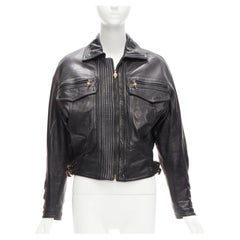 GIANNI VERSACE 1992 S&M bomber de cuero negro con hebilla dorada IT38 XS