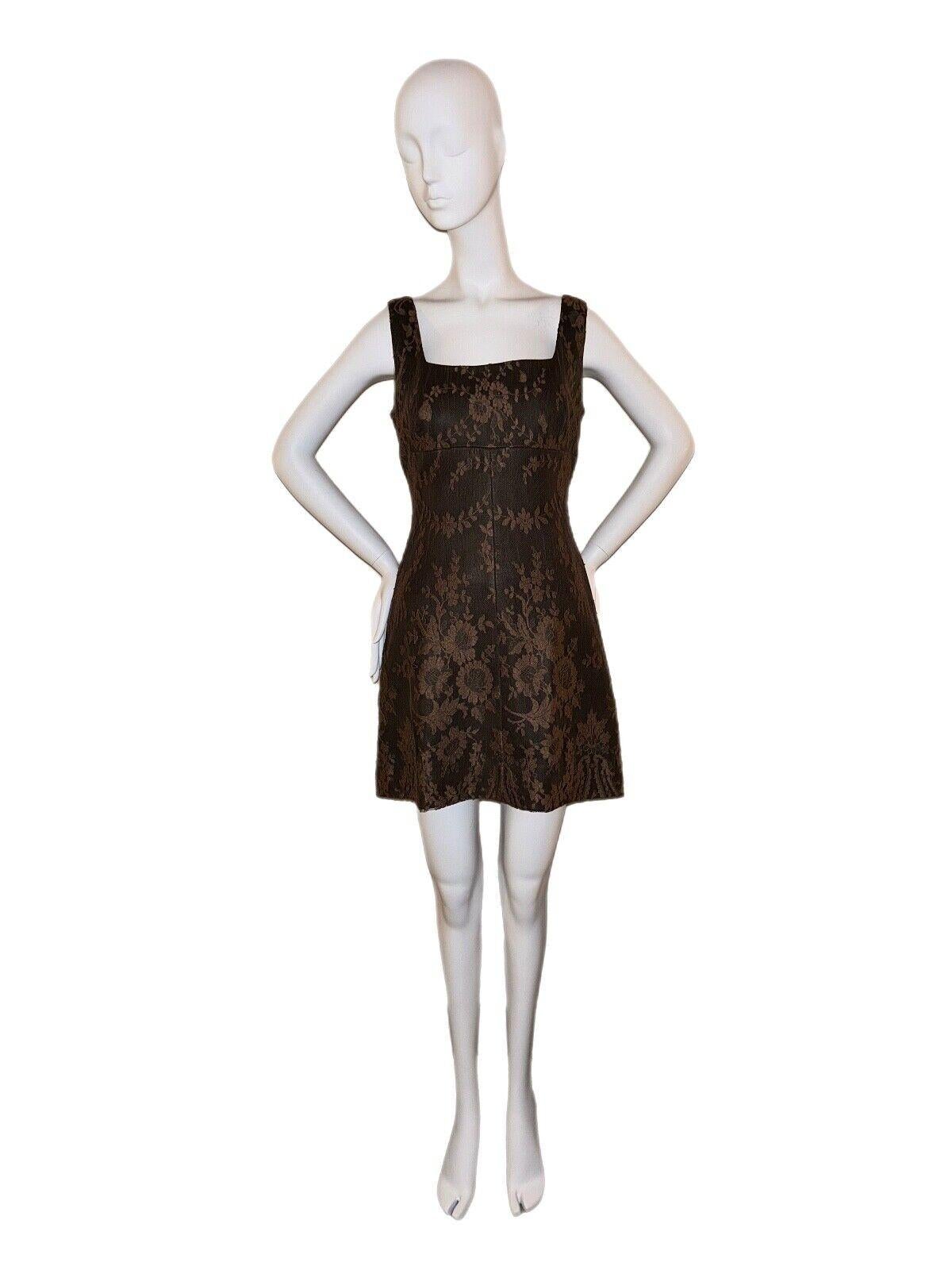 Gianni Versace
FW96
Vintage
Chocolate Brown lace + leather
IT42 
Excellent condition, minor feeling of wear
Measurements laying flat across in inches: pit to pit 15.5, length 34, waist 14
The body is 100% leather and the overlay is lace

ALL SALES