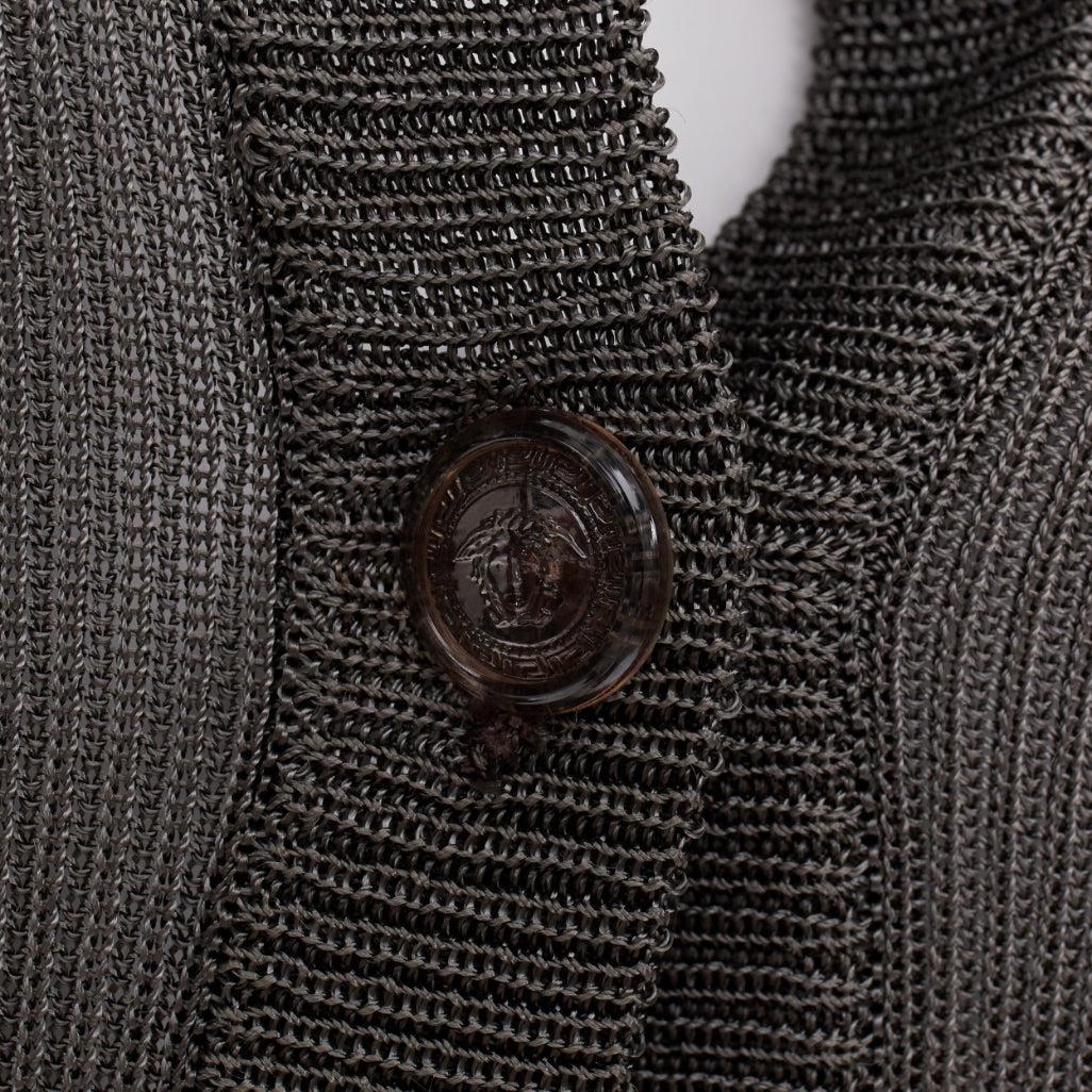 GIANNI VERSACE 1997 Vintage grey ribbed Medusa buttons military top
Reference: CC/A00412
Brand: Gianni Versace
Designer: Gianni Versace
Collection: 1997
Material: Viscose
Color: Grey, Clear
Pattern: Solid
Closure: Button
Extra Details: Clear medusa