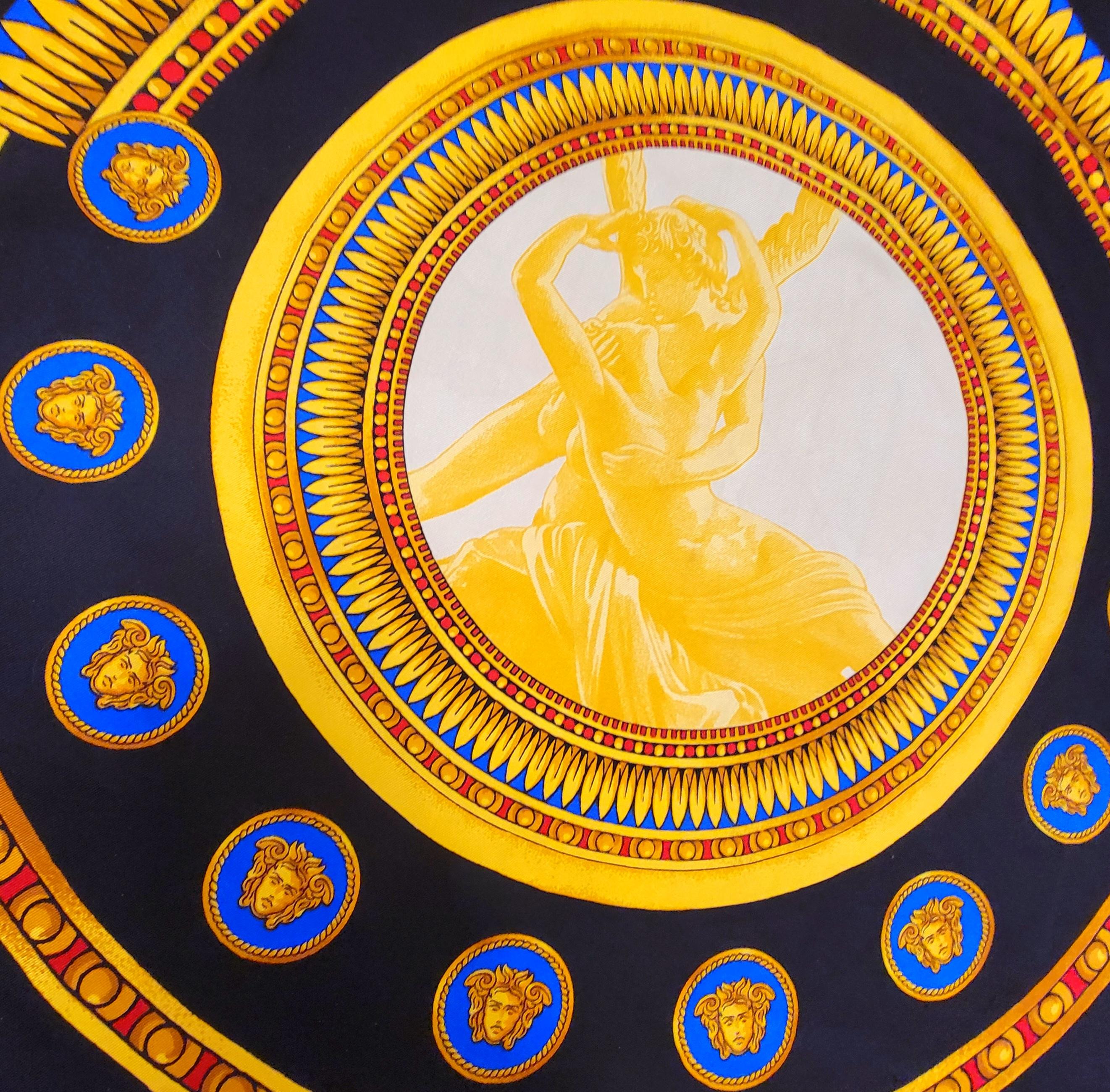 Gianni Versace Atelier Silk Scarf Vintage from the early 1990's with greek mythology baroque designs of the “Amore e Psiche” print based on Cupid sculpture and surrounded by a border of Medusa heads.

Size: 26